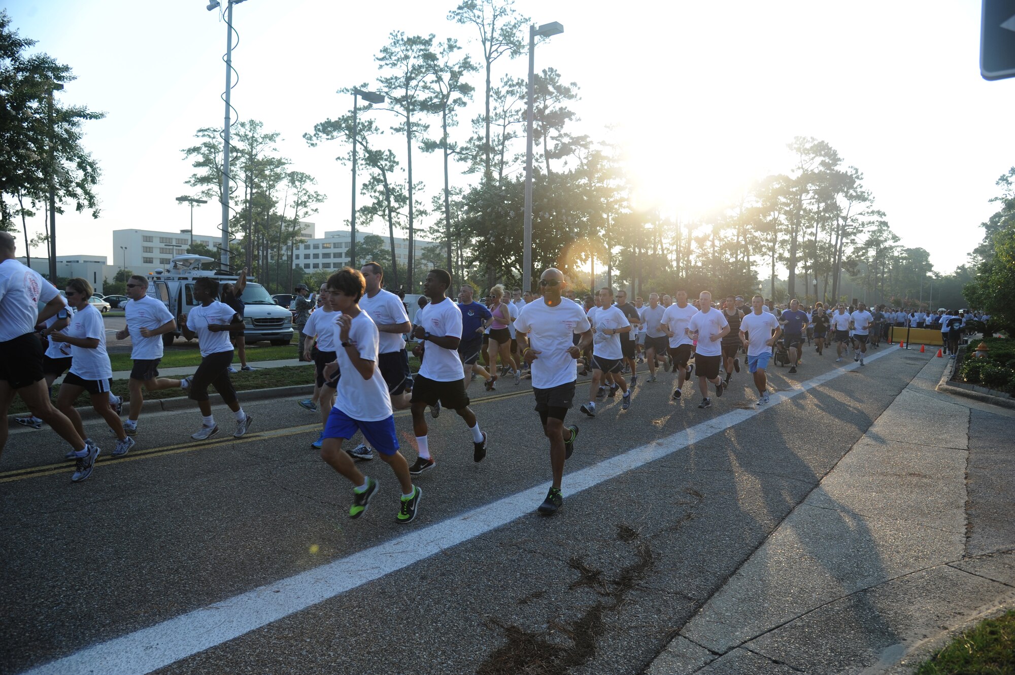 Keesler members participate in a 5K run June 21, 2013, at Keesler Air Force Base, Miss., to show their support for Oklahoma tornado victims. More than 400 people pre-registered for the run and team Keesler raised more than $10,000 total to help aid in relief efforts.  (U.S. Air Force photo by Kemberly Groue)