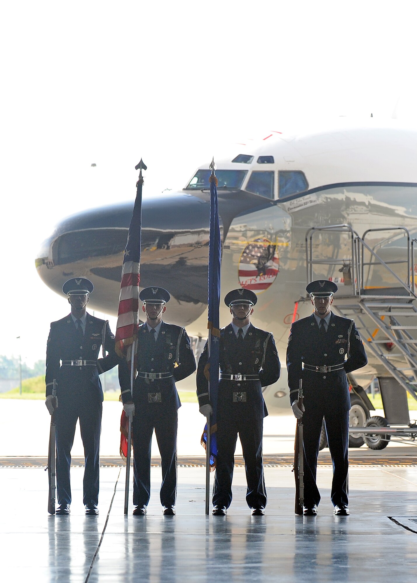The Offutt Honor Guard stands ready to post the colors for the formal wing change of command ceremony held in Dock 1 of the Bennie Davis Maintenance Facility at Offutt Air Force Base, Neb., June 19. U.S. Air Force Col. John Rauch relinquished command of the 55th Wing to U.S. Air Force Col. Gregory Guillot. (U.S. Air Force photo by Josh Plueger/Released)