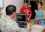 Senior Airman Jonathon Haley and wife Heather check in at the Wilford Hall Ambulatory Surgical Center’s Urgent Care Center May 29 while on leave from Ramstein Air Base, Germany. The urgent care clinic at WHASC will no longer accept walk-ins. All patients will be seen by appointment in order to cut down on waiting times. (Photo by Staff Sgt. Josie Walck)