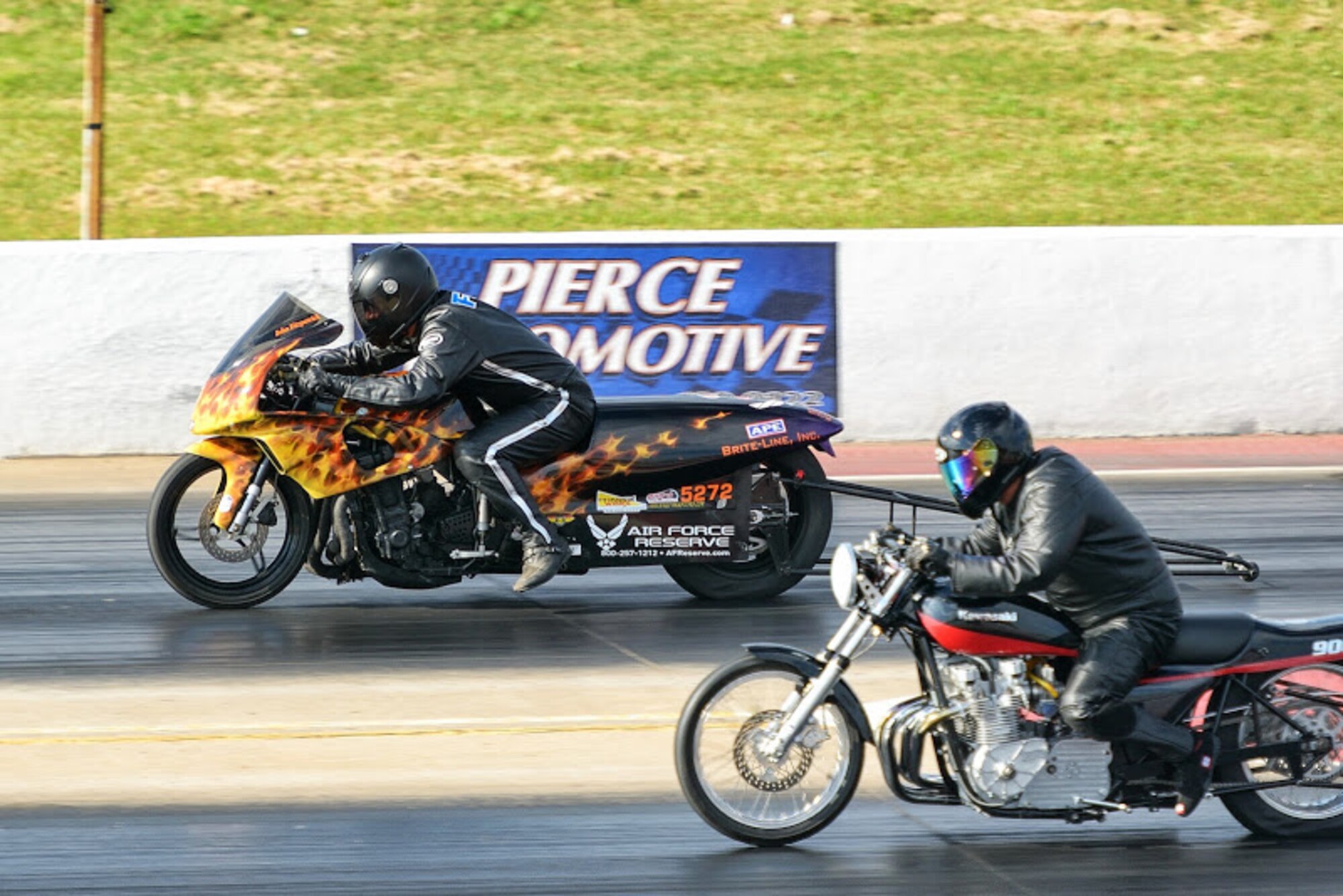 Master Sgt. John Fitzpatrick races toward the finish line at the SuperComp and Pro ET races in Noble, Oklah., June 15 2013.Fitzpatrick, an aircraft structural maintainer from the 931st Maintenance Squadron, took first place at the ProET competition and runner-up in the SuperComp. Fitzpatrick is sponsored by the Air Force Reserve Recruiting Service. (Photo courtesy of Bland Bridenstine)
