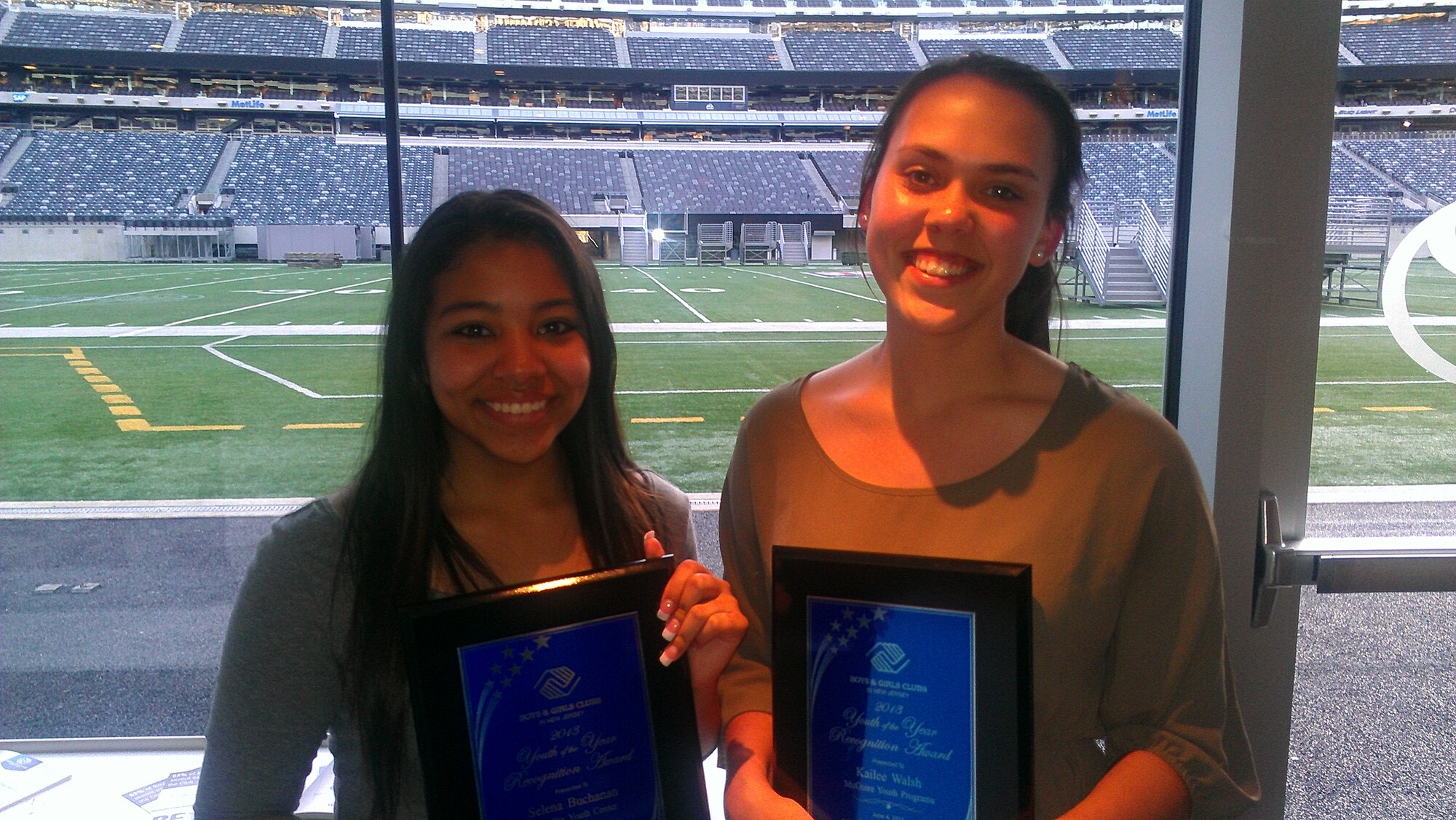 Selena Buchanan (left), Northern Burlington High School junior, earned a $20,000 scholarship from the New Jersey State Youth of the Year program for being the most outstanding boys-and-girls club member in New Jersey June 4, 2013. Kailee Walsh, Northern Burlington High School sophomore, won second place in the competition. (U.S. Air Force courtesy photo/Released)