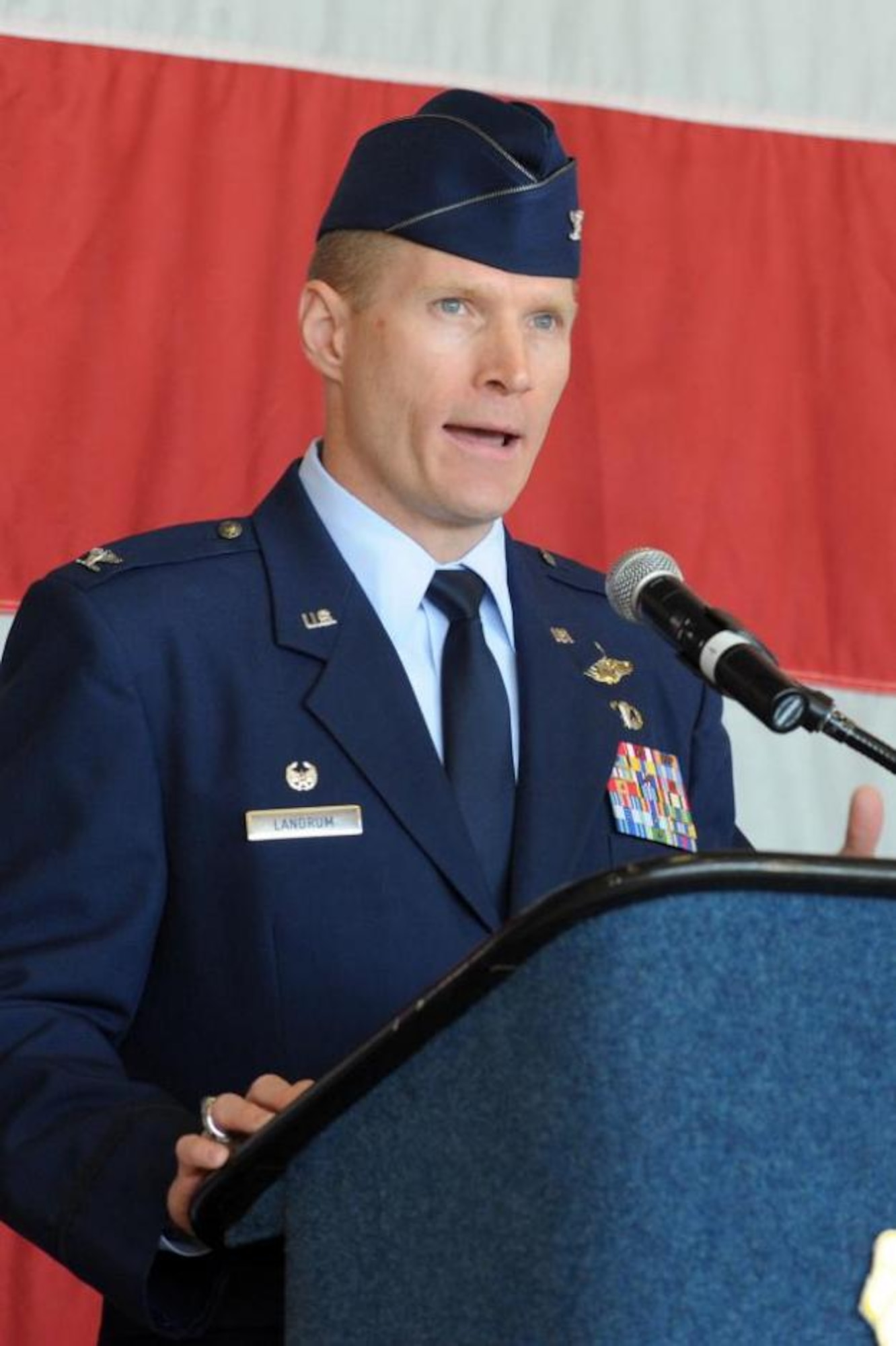 Col. Lance “Spike” Landrum speaks at the 388th Fighter Wing change of command ceremony June 14 at Hill Air Force Base, Utah. Landrum assumed command of the fighter wing. (Alex R. Lloyd/U.S. Air Force)
