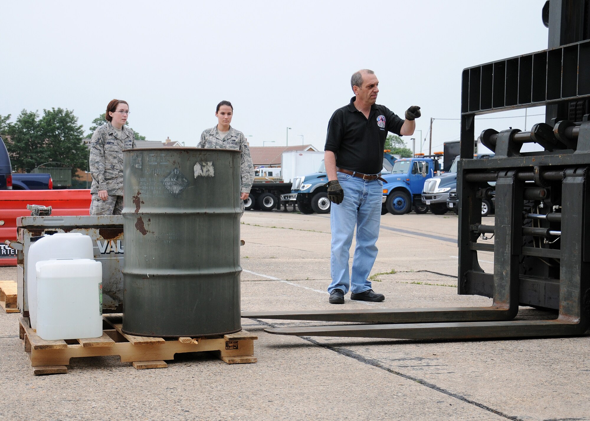 David Green, 100th Logistics Readiness Squadron Vehicle Operations training manager from Wisbech, Cambridgeshire, trains service members and civilians how to safely operate a forklift June 21, 2013, on RAF Mildenhall, England. To reiterate the highest safety standards, and as a response to several munitions and materiel handling incidents within U.S. Air Forces in Europe during general warehousing operations, Brig. Gen. Warren D. Berry, USAFE Director, Logistics, Installations and Missions Support, directed a safety stand-down day across USAFE. (U.S. Air Force photo by Gina Randall/Released)