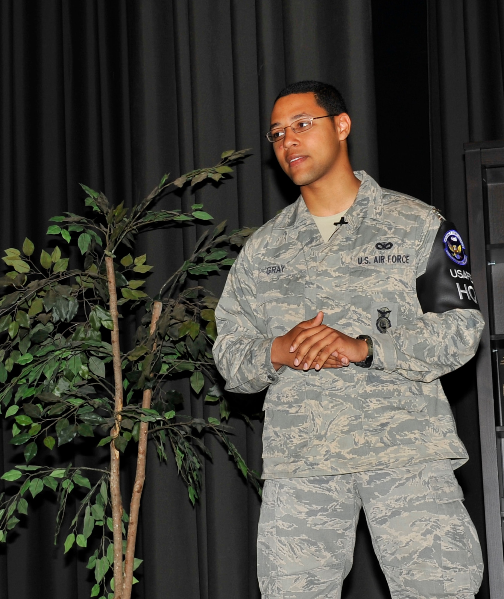 Airman 1st Class Matthew Gray, 86th Security Forces Squadron patrolman, shares his story at the storytellers' event May 10, 2013, Ramstein Air Base, Germany. Gray spoke about his transition from having a tough childhood to becoming an Airman. The storytellers' event gave Airmen the opportunity to come together and share their stories. (U.S. Air Force photo/Airman 1st Class Trevor Rhynes)