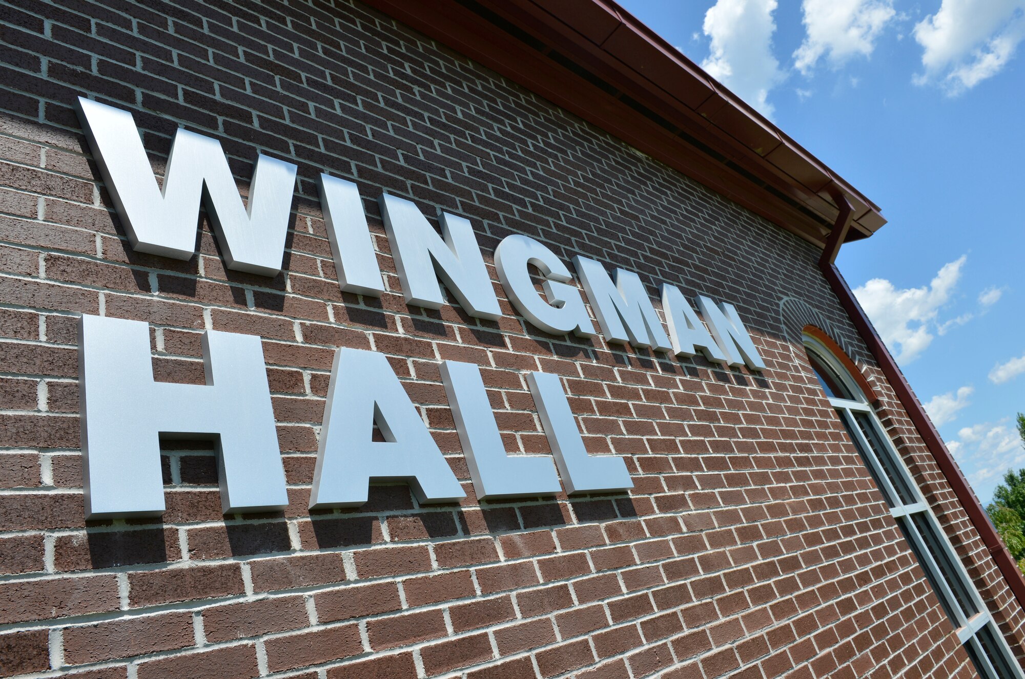 MCGHEE TYSON AIR NATIONAL GUARD BASE, Tenn. – Wingman Hall at the I.G Brown Training and Education Center was constructed more than a decade ago, but it went without an official name until June 2013. The TEC’s Professional Continuing Education Division makes good use of the space as well as the 134th Air Refueling Wing and base family support services. Base personnel also use the building for weekly spiritual services and study. (U.S. Air National Guard photo by Master Sgt. Kurt Skoglund/Released)