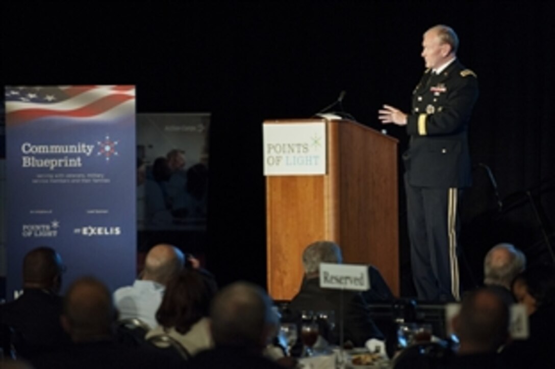 Army Gen. Martin E. Dempsey, chairman of the Joint Chiefs of Staff, addresses an audience at the 2013 Service Unites Conference on Volunteering and Service sponsored by Points of Light in Washington D.C., June 21, 2013. 
