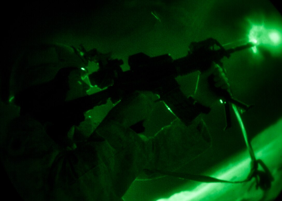 A 26th Marine Expeditionary Unit (MEU) Maritime Raid Force Marine fires an M4 carbine during a nighttime live fire in Jordan, June 21, 2013. Exercise Eager Lion 2013 is an annual, multinational exercise designed to strengthen military-to-military relationships and enhance security and stability in the region by responding to modern-day security scenarios. The 26th MEU is a Marine Air-Ground Task Force forward-deployed to the U.S. 5th Fleet area of responsibility aboard the Kearsarge Amphibious Ready Group serving as a sea-based, expeditionary crisis response force capable of conducting amphibious operations across the full range of military operations. (U.S. Marine Corps photograph by Sgt. Christopher Q. Stone, 26th MEU Combat Camera/Released)