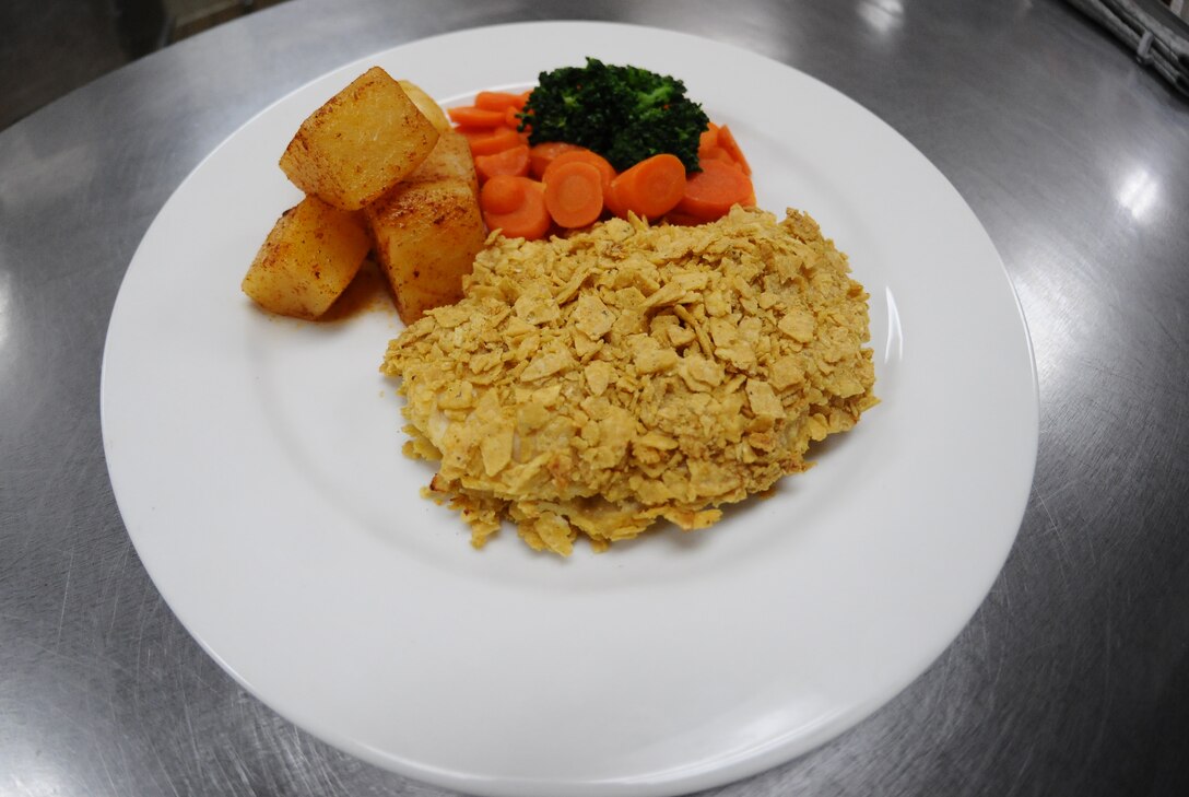 Mr. Z’s Finger Lickin’ Baked Chicken is a traditional Air Force recipe created by retired Chief Master Sgt. Robert J. Zahorchak. He created the recipe before retiring from the Air Force and continuing his food services career as a civilian. (U. S. Air Force photo by Airman 1st Class Emily A. Bradley/Released)