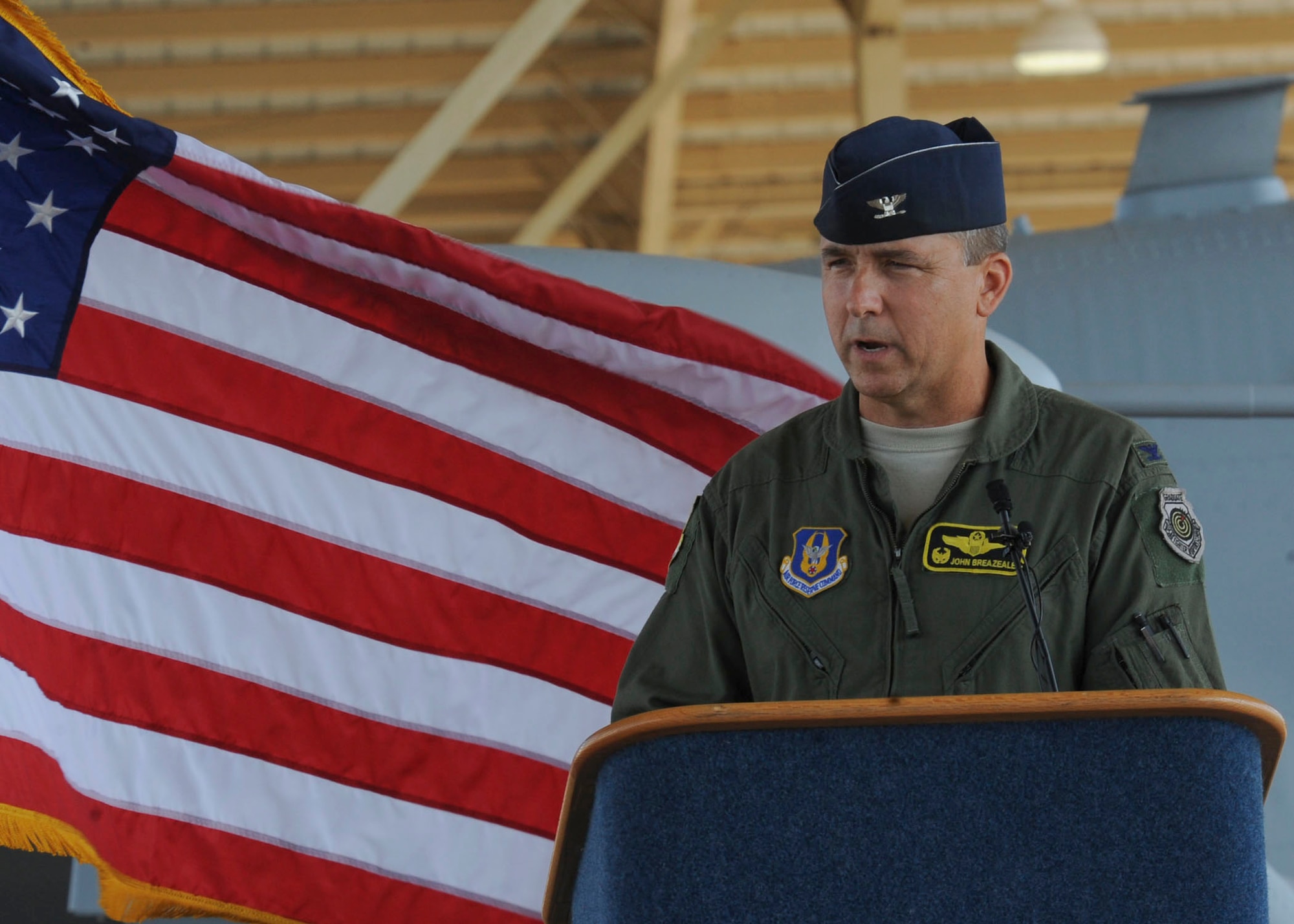 Col. John Breazeale, 917th Fighter Group commander, addresses Airmen and community members who gathered to bid farewell to the A-10 Thunderbolt II aircraft on Barksdale Air Force Base, La., June 24, 2013. Breazeale piloted one of the aircraft which departed Barksdale after 33 years. (U.S. Air Force photo)(Senior Airman Kristin High)