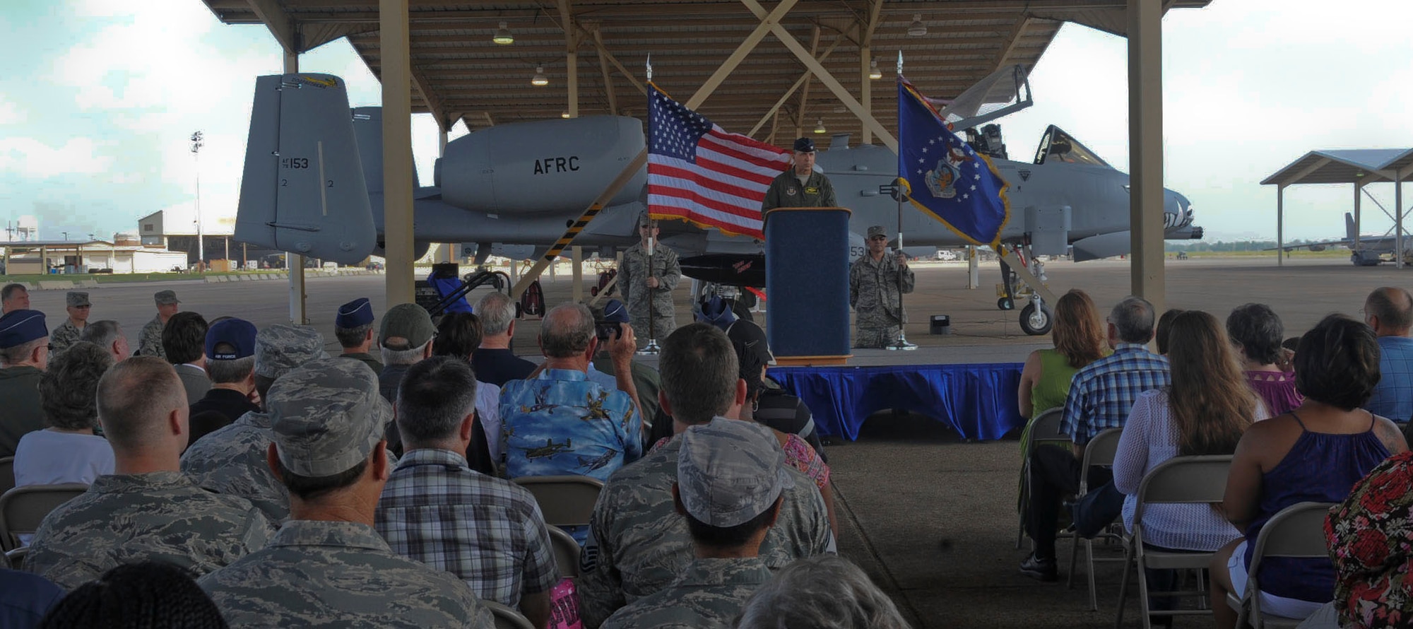 Col. John Breazeale, 917th Fighter Group commander, addresses Airmen and community members who gathered to bid farewell to the A-10 Thunderbolt II aircraft on Barksdale Air Force Base, La., June 24, 2013.  The final three A-10s departed after 33 years on Barksdale. (U.S. Air Force photo)(Senior Airman Kristin High)