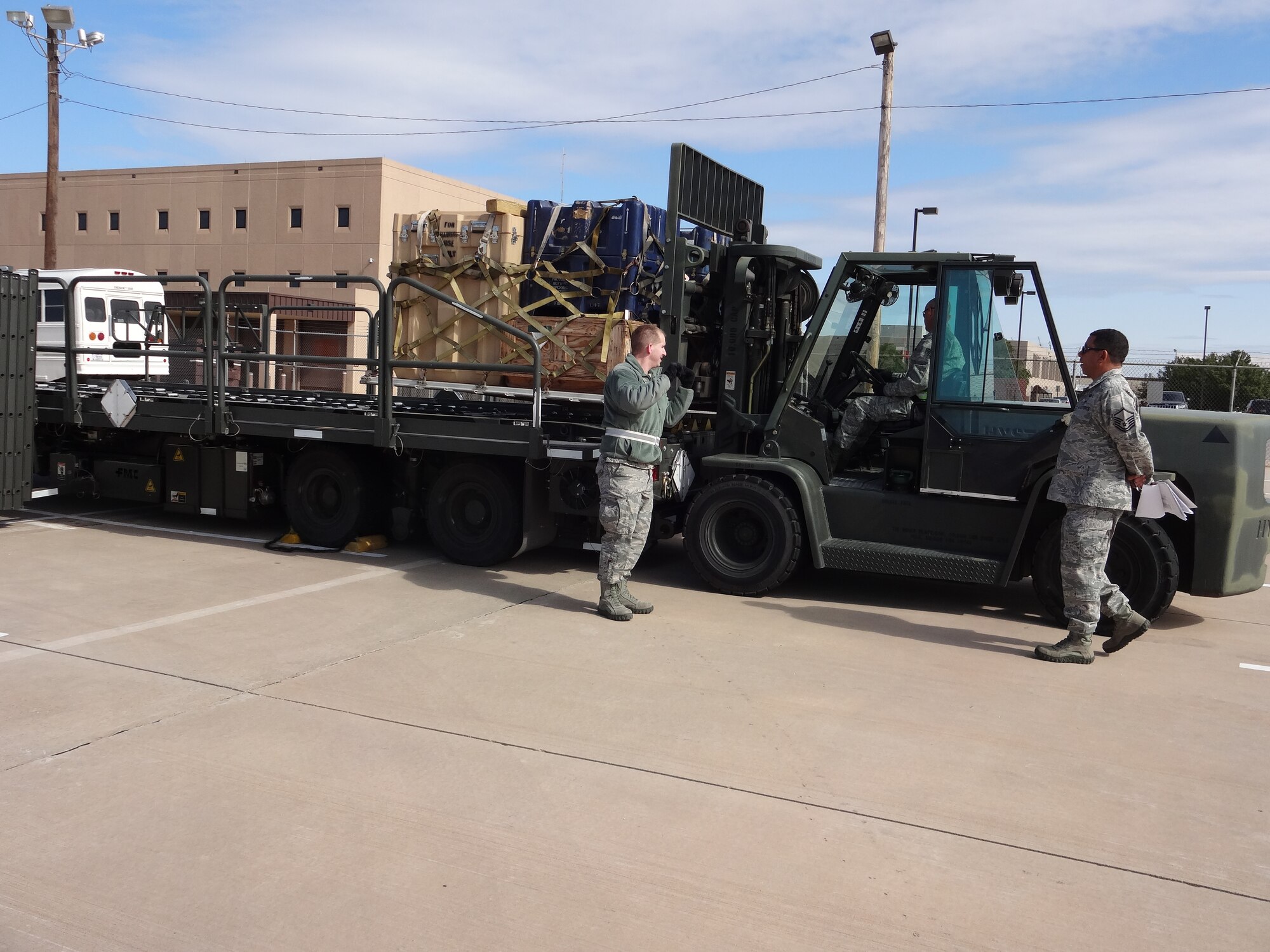 Members of the 72nd Aerial Port Squadron competed in a local rodeo competition demonstrating their skills in loading and preparing cargo for delivery. (Courtesy Photo) 