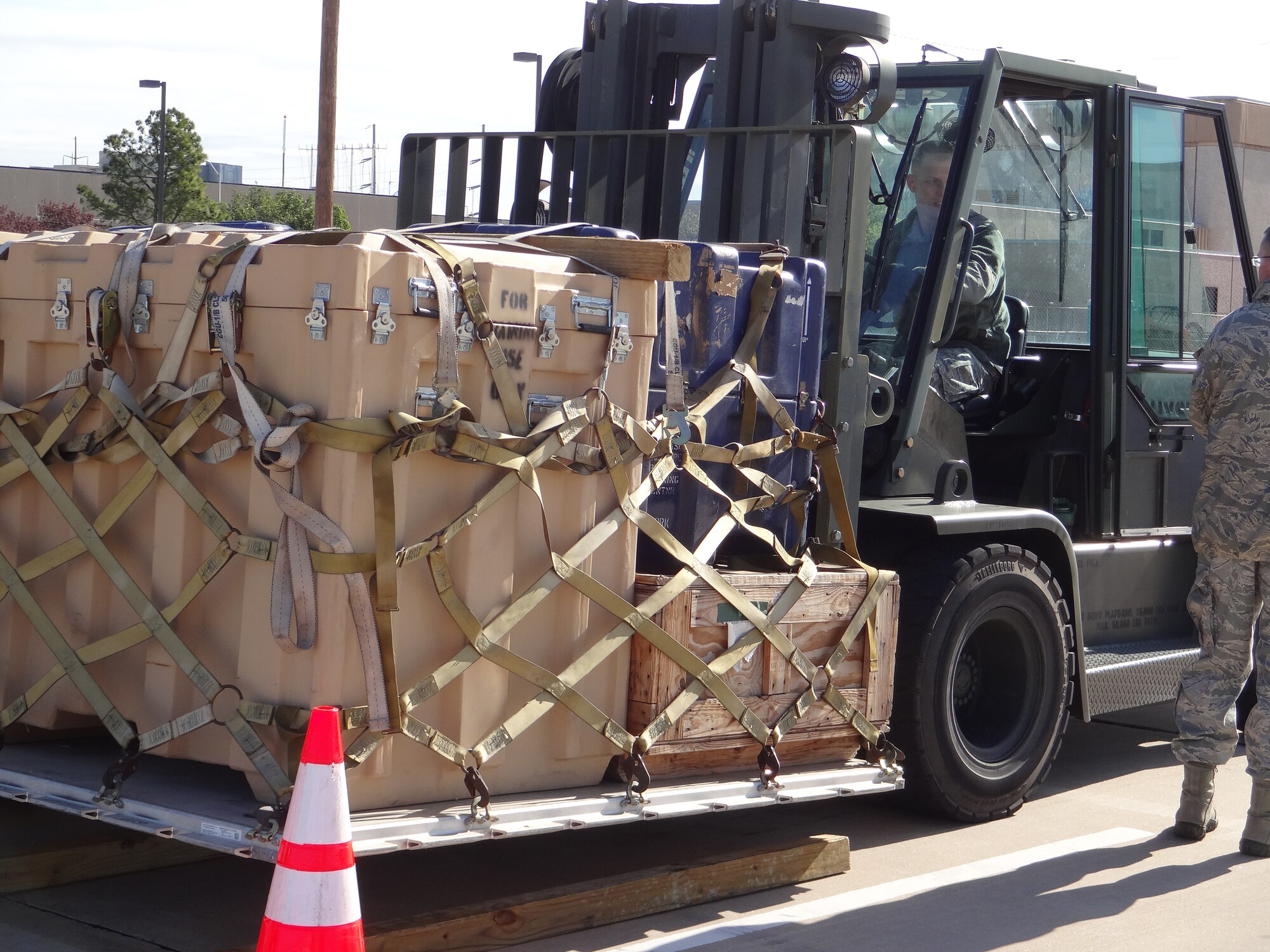 Members of the 72nd Aerial Port Squadron competed in a local rodeo competition demonstrating their skills in loading and preparing cargo for delivery. (Courtesy Photo) 