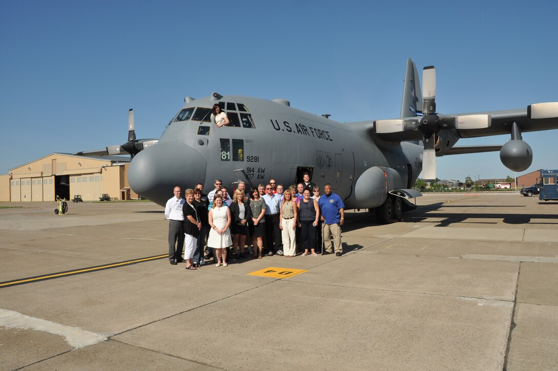 Leadership Niagara members pose in front of a C-130 during a tour here, June 20, 2013. (U.S. Air Force photo by Staff Sgt. Stephanie Clark)