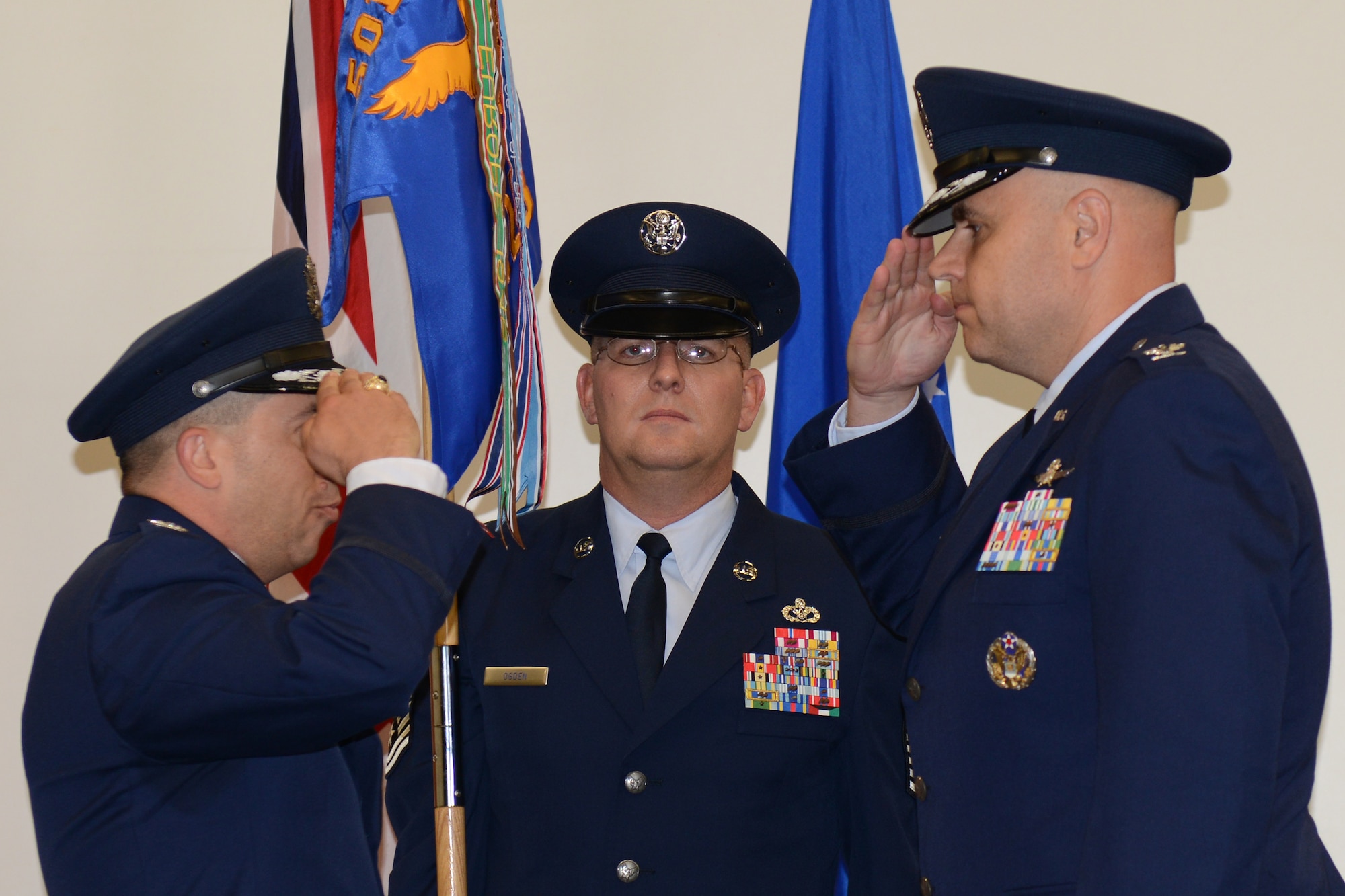 RAF MOLESWORTH, United Kingdom-Col. Steve Sweeney assumes command of the 423rd Air Base Group from Col. Brian Kelly, 501st Combat Support Wing commander, in a change of command ceremony at the RAF Molesworth June 21. (U.S. Air Force photo by Tech. Sgt. Chrissy Best)