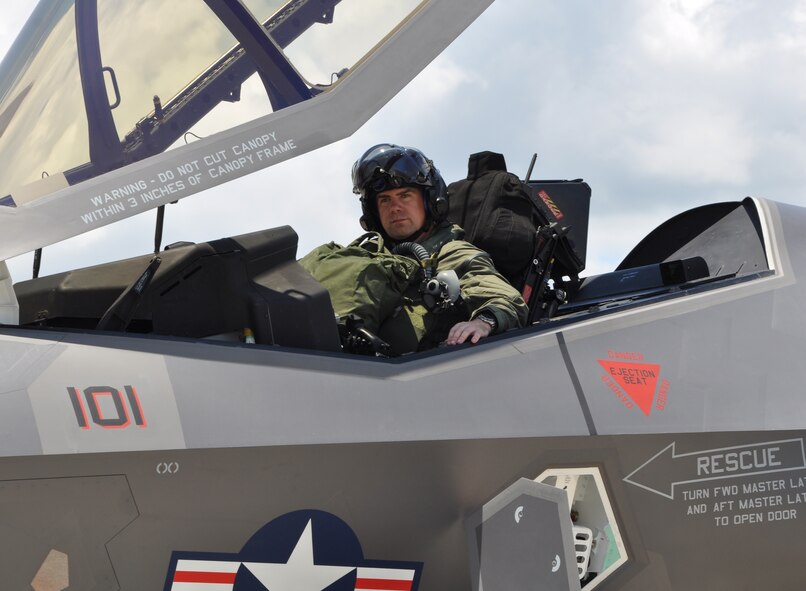 EGLIN AIR FORCE BASE, Fla. – Navy Lt. Cmdr. Christopher Tabert, F-35C Lightning II instructor pilot, U.S. Navy Strike Fighter Squadron VFA-101 prepares to exit the cockpit after landing at Eglin Air Force Base's 33rd Fighter Wing June 22. The pilot delivered the Navy's first F-35C Lightning II carrier variant aircraft from Lockheed Martin to the U.S. Navy's Strike Fighter Squadron (VFA) 101 home co-located with the 33rd FW. The unit serves as the F-35C Fleet Replacement Squadron, training F-35C aircrew and maintenance personnel alongside Air Force, Marine and coalition partners in the joint strike fighter program. (U.S. Air Force photo/Maj. Karen Roganov)