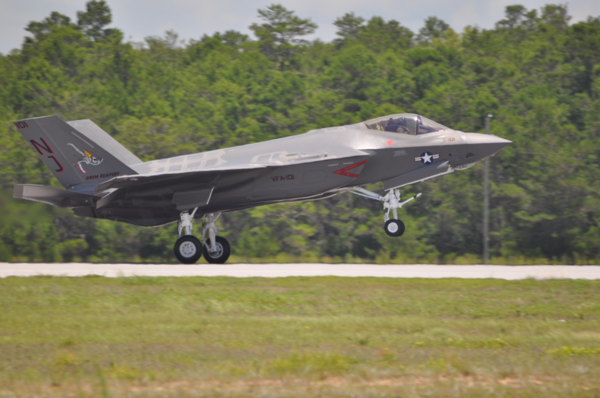 EGLIN AIR FORCE BASE, Fla. – Navy Lt. Cmdr. Christopher Tabert, F-35C Lightning II instructor pilot, U.S. Navy Strike Fighter Squadron VFA-101 lands June 22 at Eglin Air Force Base's 33rd Fighter Wing after a two hour flight from Ft. Worth, Texas. The U.S. Navy's Strike Fighter Squadron (VFA) 101 received the Navy's first F-35C Lightning II carrier variant aircraft from Lockheed Martin at the squadron's home. VFA 101, co-located with the 33rd FW, will serve as the F-35C Fleet Replacement Squadron, training F-35C aircrew and maintenance personnel alongside Air Force, Marine and coalition partners in the joint strike fighter program. (U.S. Air Force photo/Maj. Karen Roganov)