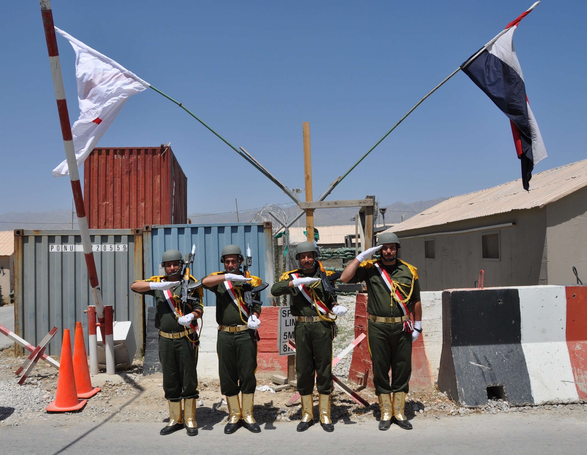 An Egyptian color guard practices before the El Salam Egyptian field hospital re-opening on Bagram Airfield, Afghanistan, June 22. The field hospital had been closed as the unit there prepared for performing their changeover and equipment accountability processes. (U.S. Air Force photo/Tech. Sgt. Rob Hazelett)