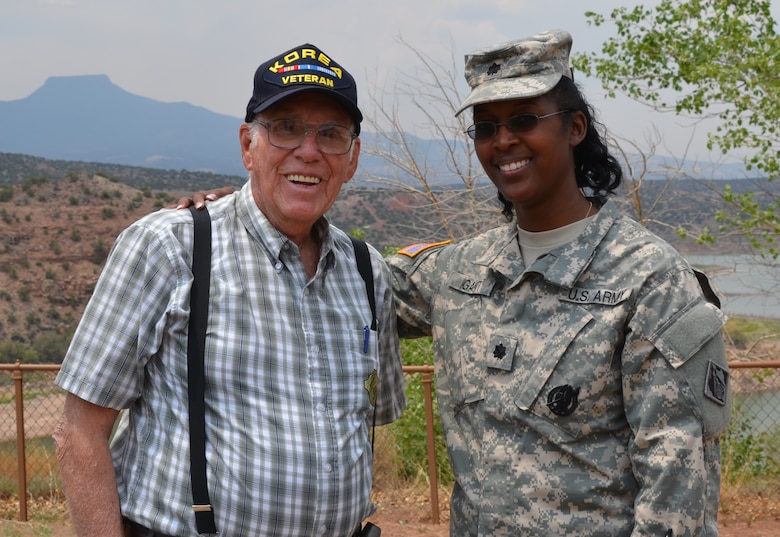 ABIQUIU LAKE, N.M., -- District Commander Lt. Col Gant shares a moment with former Abiquiu Lake Operations Manager Jimmy Hurt after presenting him with an Albuquerque district coin for all of his dedication and hard work, June 13, 2013.