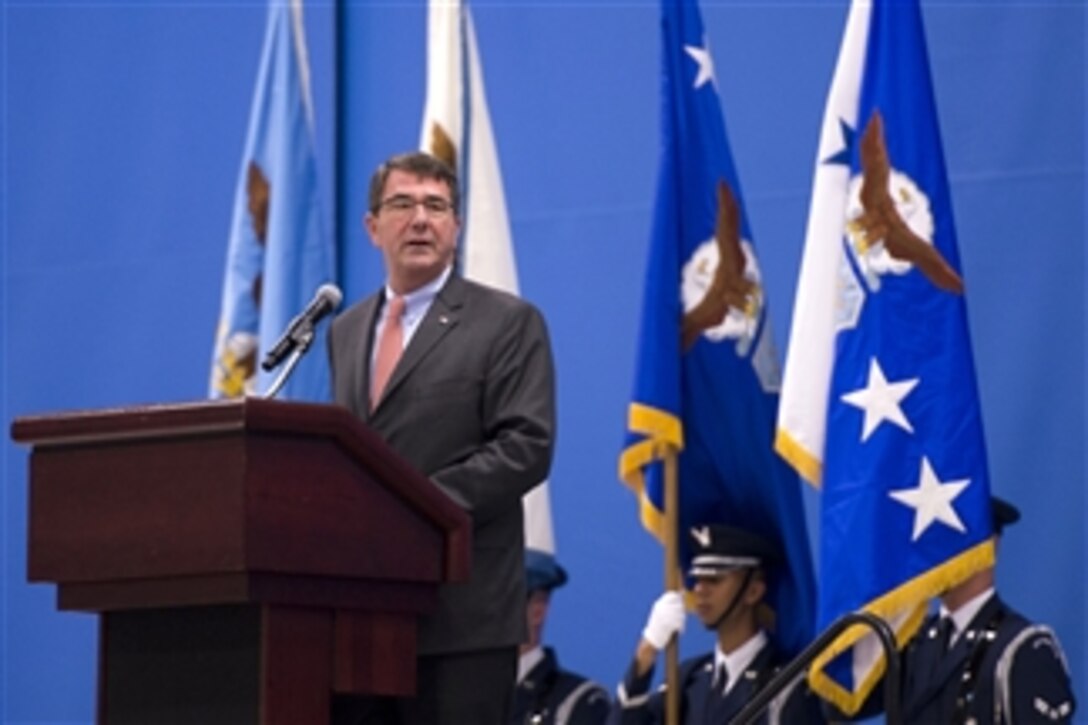Deputy Secretary of Defense Ashton Carter speaks at the farewell ceremony for Secretary of the Air Force Michael B. Donley at Joint Base Andrews, Md., on June 21, 2013.  Donley served as the 22nd and longest serving secretary in the history of the Air Force.  