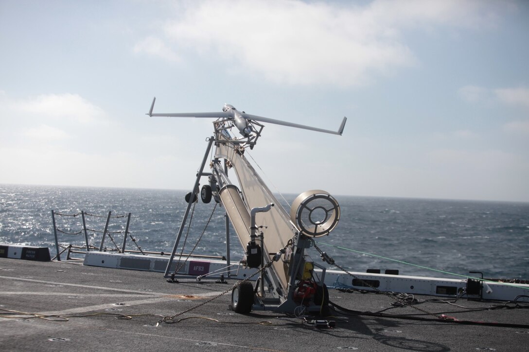 130618-M-OH054-086
PACIFIC OCEAN ABOARD USS NEW ORLEANS (LPD-18) – A Scan Eagle Unmanned Aerial Vehicle belonging to Marine Unmanned Aerial Vehicle Detachment, Marine Medium Titlrotor Squadron 166 (Reinforced), 13th Marine Expeditionary Unit, launches during flight operations as part of PHIBRON MEU Integration aboard the USS New Orleans (LPD-18), June 18, 2013. PMINT is a three week long pre-deployment training event focusing on the combined Marine Expeditionary Unit and Amphibious Ready Group capabilities and the strengthening of the Navy and Marine Corps team. (Official U.S. Marine Corps photo by Sgt. Christopher O’Quin/Released)