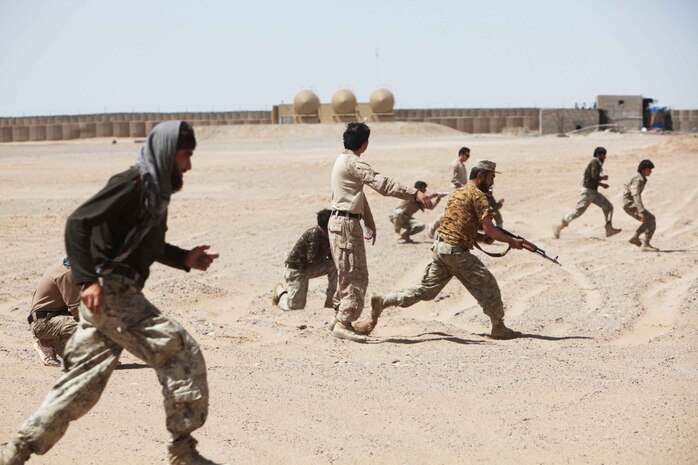 Afghan National Civil Order Police with the 2nd Kandak, 7th Brigade conduct training at the ANCOP station here, June 17, 2013. "They don't need us to fight, or show them how to fight," said Maj. Stephen T. Campbell, the team leader of ANCOP Advisor Team 2 and a native of Coral Springs, Fla. "They're very aggressive--allowing us to assume a more over-the-shoulder approach since we've been here."