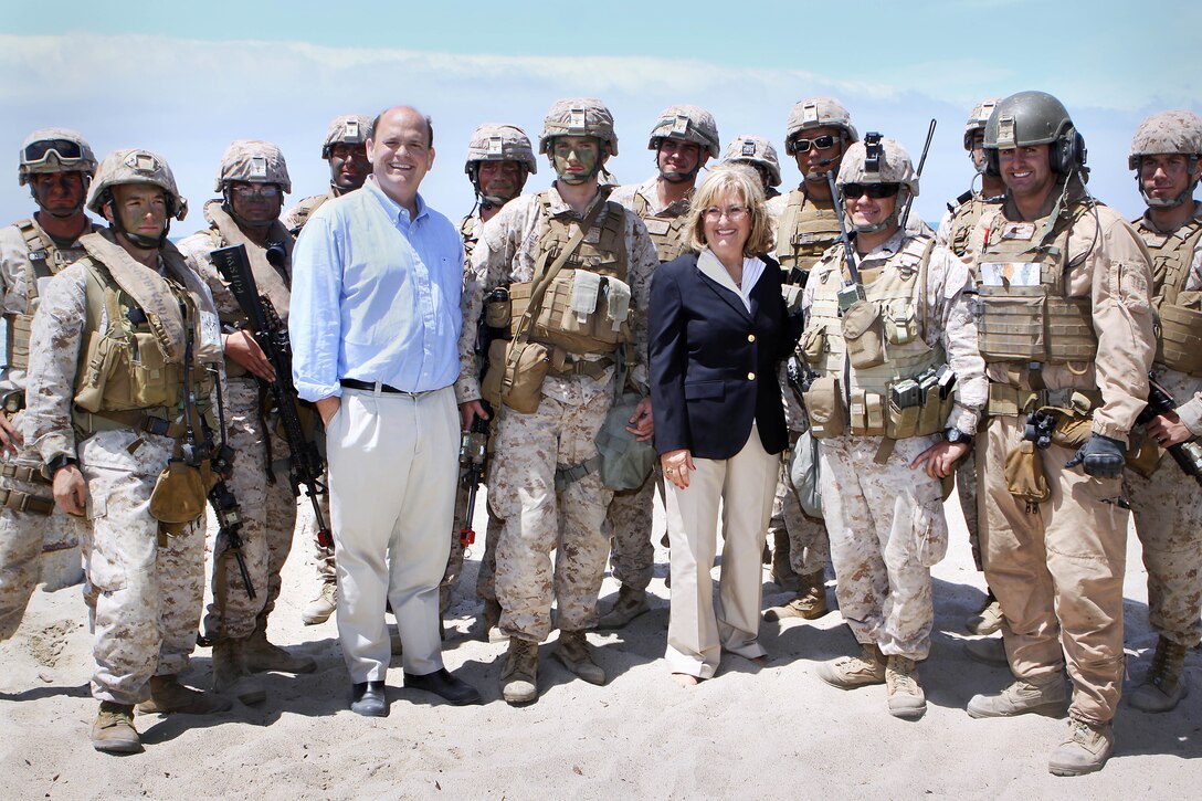 Diane Black and Tom Reed, center, paused for a photo with Marines from I Marine Expeditionary Force participating in a training exercise during a visit to Camp Pendleton where they learned about the base, its functions and daily operations June 23. Black is a congresswoman for the sixth district of Tennessee and Reed is a congressman for the 23rd district of New York. 