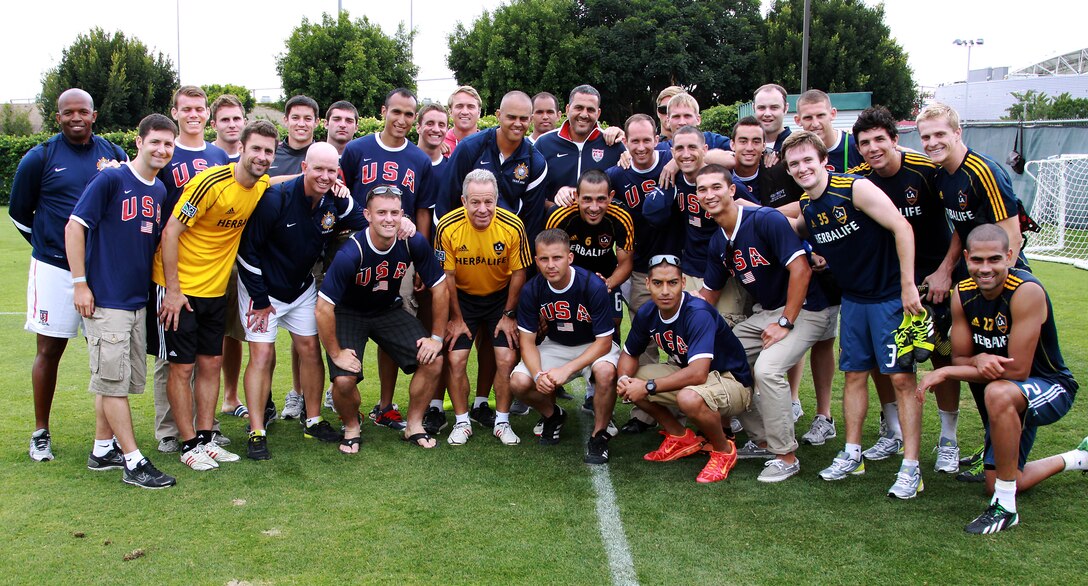 The Team USA Armed Forces meets with Los Angeles Galaxy coaches and players after observing one of their practices at the Stub Hub Stadium in Los Angeles June 25. The military Team USA is made up of Soldiers, Sailors, Airmen, and Marines from all over the world. Team USA is scheduled to play in the 1st Annual Military World Cup held in Baku, Azerbaijan. The LA Galaxy invited Team USA to watch and learn from their practice time. 