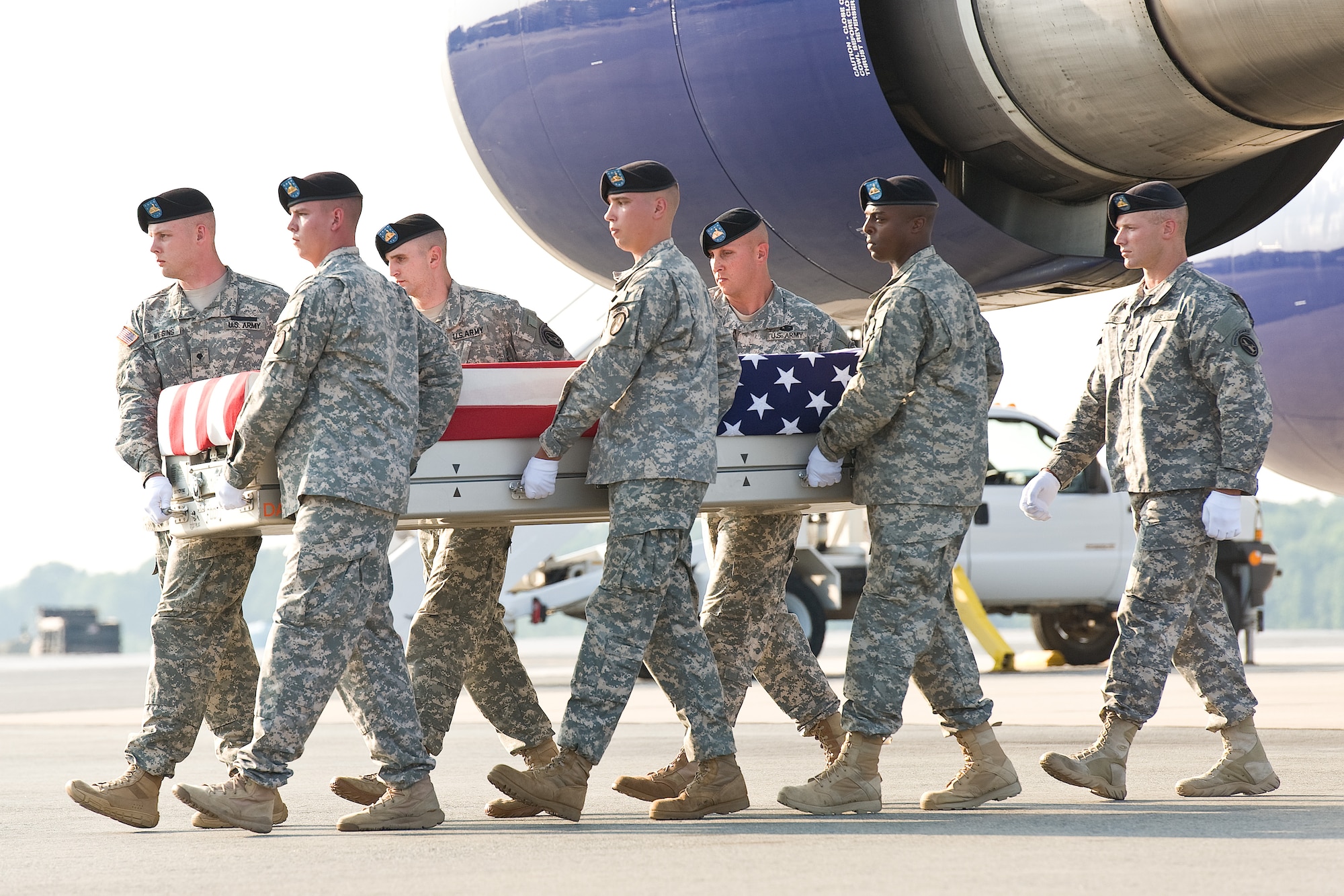 A U.S. Army carry team transfers the remains of Army Sgt. Corey E. Garver of Topsham, Maine, June 25, 2013 at Dover Air Force Base, Del. Garver was assigned to the 1st Battalion, 506th Infantry Regiment, 4th Brigade Combat Team, Fort Campbell, Ky. (U.S. Air Force photo/Roland Balik)