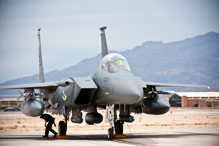 An F-15E Strike Eagle assigned to the 335th Fighter Squadron, Seymour Johnson Air Force Base, N.C., prepares to taxi out for a training mission during Green Flag-West 13-5 June 24, 2013, at Nellis Air Force Base, Nev. A typical Green Flag exercise involves two multi-role fighter and/or bomber squadrons, unmanned aircraft, electronic warfare aircraft, and aerial refueling aircraft. (U.S. Air Force photo/Senior Airman Brett Clashman)