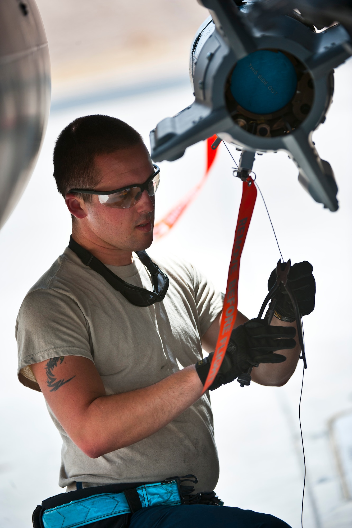 Senior Airman Robert Tracy, 4th Aircraft Maintenance Squadron aircraft armament systems technician during Green Flag-West 13-5 June 24, 2013, at Nellis Air Force Base, Nev. Green Flag-West is a realistic air-land integration combat training exercise administered by the US Air Force Air Warfare Center and Nellis AFB through the 549th Combat Training Squadron. (U.S. Air Force photo/Senior Airman Brett Clashman)