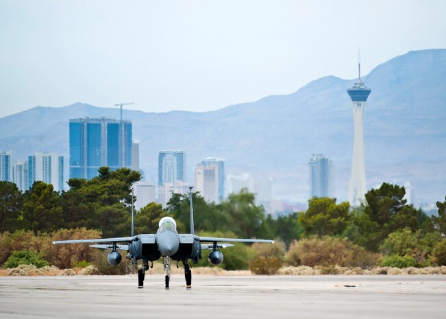 An F-15E Strike Eagle assigned to the 335th Fighter Squadron, Seymour Johnson Air Force Base, N.C., taxis on the runway during Green Flag-West 13-5 June 24, 2013, at Nellis Air Force Base, Nev. The mission of the 335th FS is to be prepared to deploy anywhere in the world on short notice and deliver an array of air-to-ground weapons with pinpoint accuracy. (U.S. Air Force photo/Senior Airman Brett Clashman)