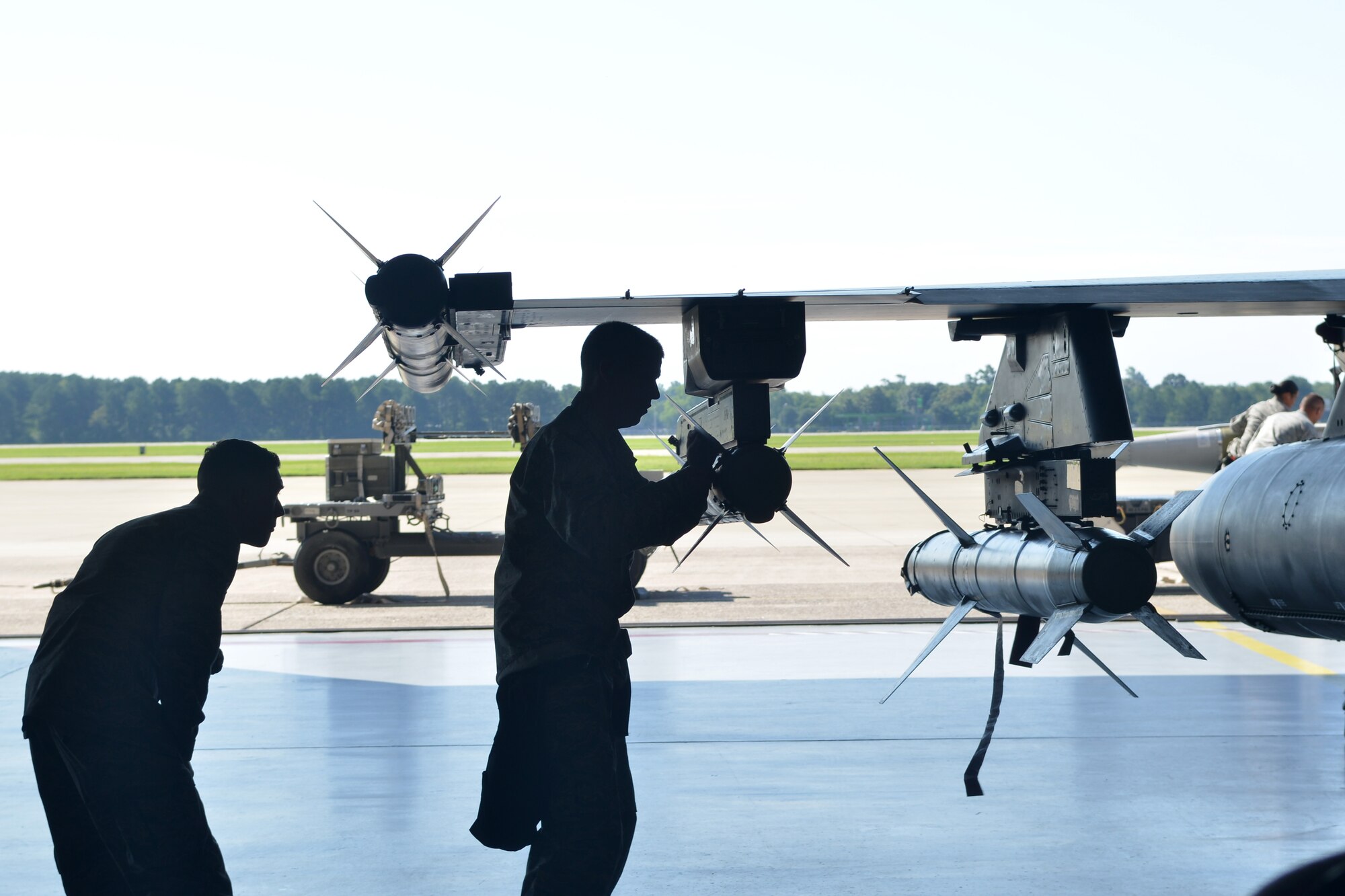 U.S. Air Force Airman 1st Class Dylan Zamminer, 20th Aircraft Maintenance Squadron weapons load crew member, gets inspected during a weapons load competition, Shaw Air Force Base, S.C., June 21, 2013. The competition consists of crew members from all three fighter squadrons. (U.S. Air Force photo by Airman 1st Class Ashley L. Gardner/Released)