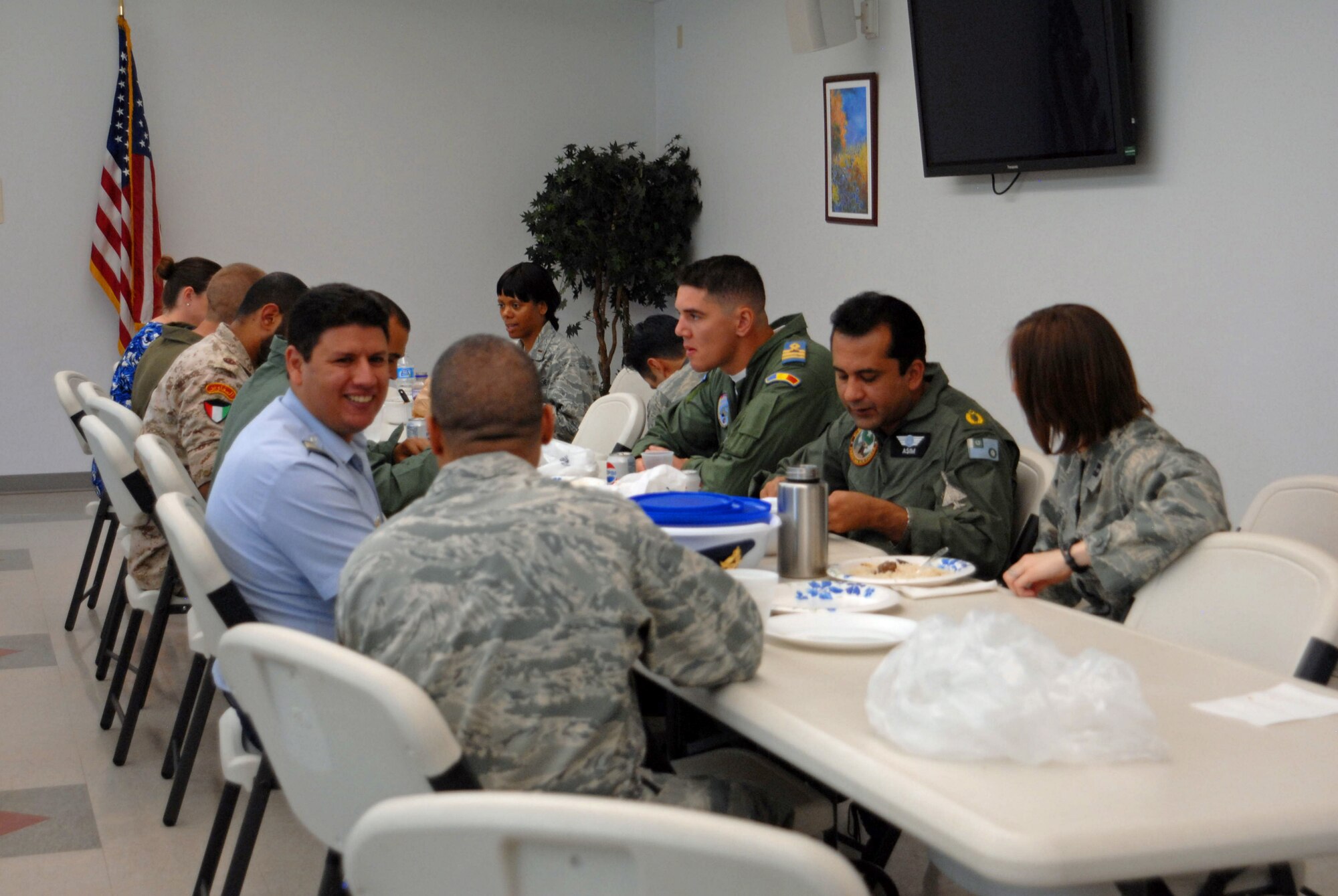GOODFELLOW AIR FORCE BASE, Texas – International students and instructors from the 315th Training Squadron have lunch during the International Student Brown Bag Luncheon, June 18, at the base chapel. International students had a chance to learn about American customs during the luncheon. (U.S. Air Force photo/ Airman 1st Class Breonna Veal)
