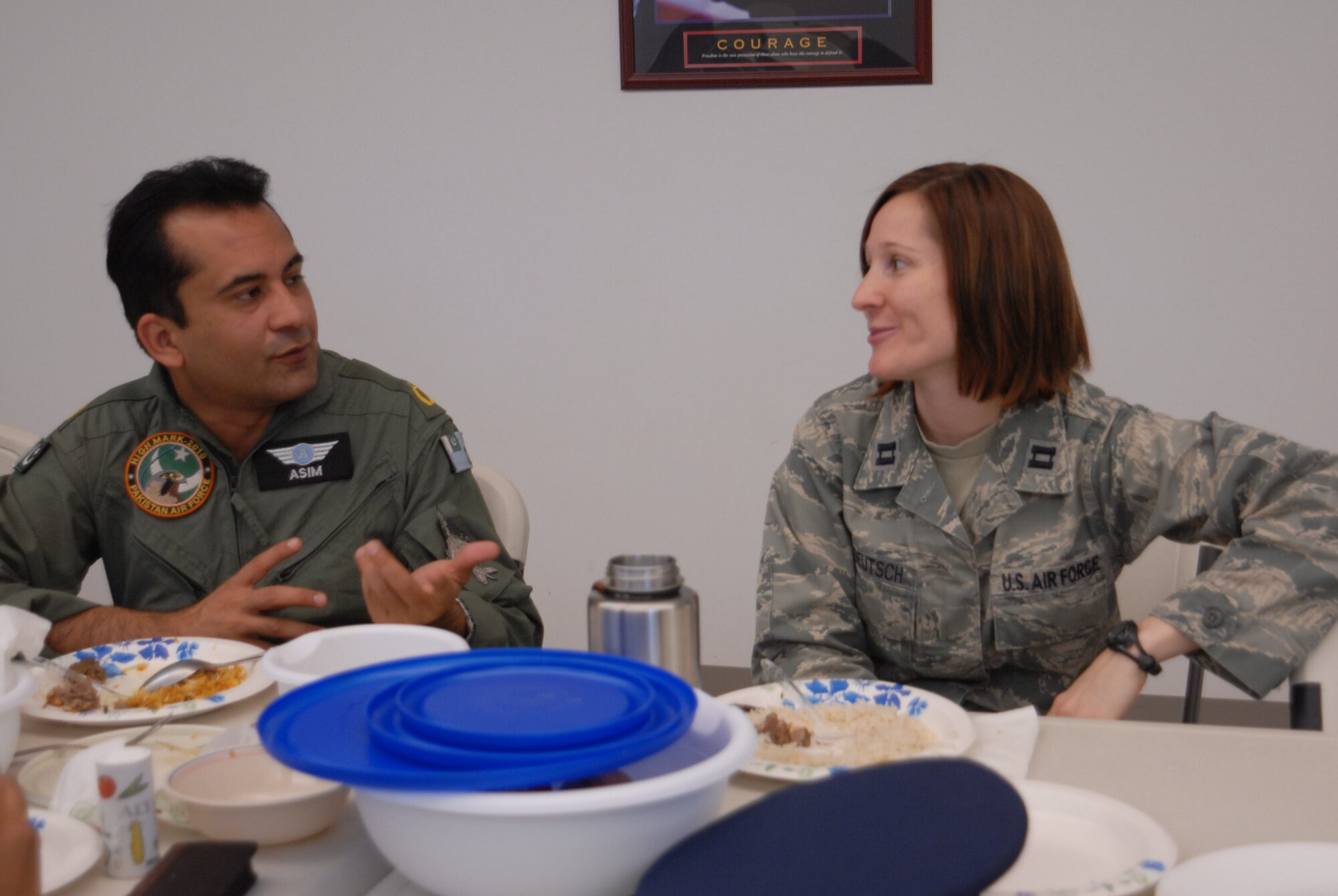 GOODFELLOW AIR FORCE BASE, Texas – An international student from the 315th Training Squadron and Capt. Sara Undeutsch, 315th TRS instructor, converse about different customs and courtesies during the International Student Brown Bag Luncheon June 18 at the base chapel. Team Goodfellow hosts international officer students from at least seven different countries. (Air Force photo/ Airman 1st Class Breonna Veal) 