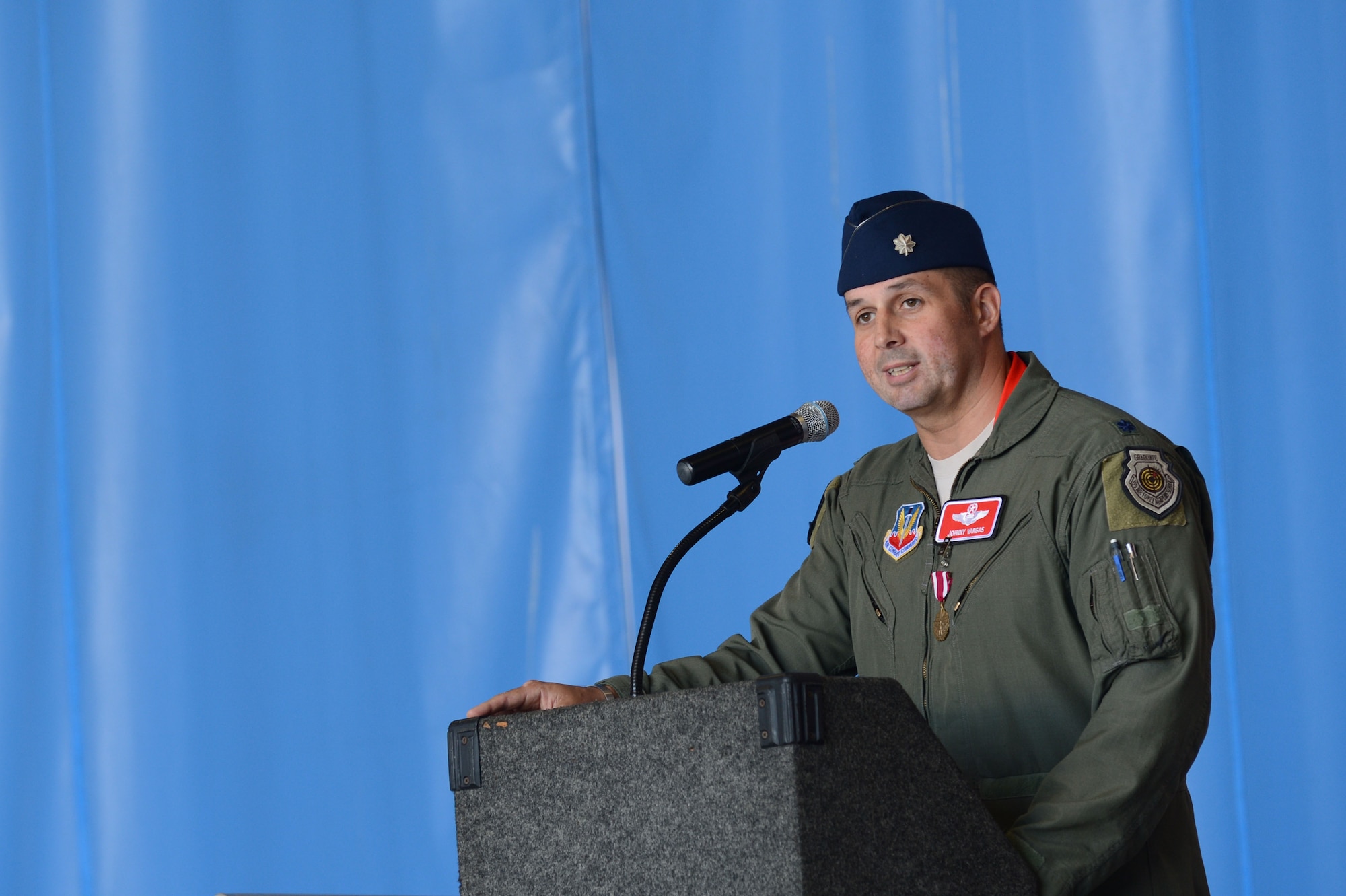 U.S. Air Force Lt. Col. John Vargas, 77th Fighter Squadron commander, speaks at the 77th FS change of command, Shaw Air Force Base, S.C., June 21, 2013.  Vargas handed his title of commander to Lt. Col. Matthew Ayres, 79th FS director of operations. (U.S. Air Force photo by Airman 1st Class Nicole Sikorski/Released).  