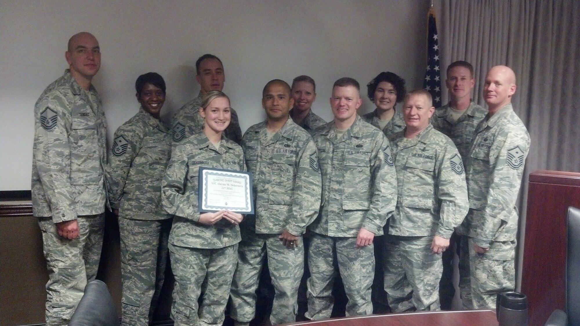 PETERSON AIR FORCE BASE, Colo. -- Airman 1st Class Alayna Deherrera, 21st Mission Support Group knowledge operator, was selected by the Pikes Peak Top 3 for the Diamond Sharp Award. The award recognizes Airmen who go beyond their everyday tasks and demonstrate a high level of excellence, specifically in customer service and professional appearance. Any first sergeant or senior NCO serving as a first sergeant who observes outstanding performance may nominate someone for the award to the first sergeants council. (U.S. Air Force photo)