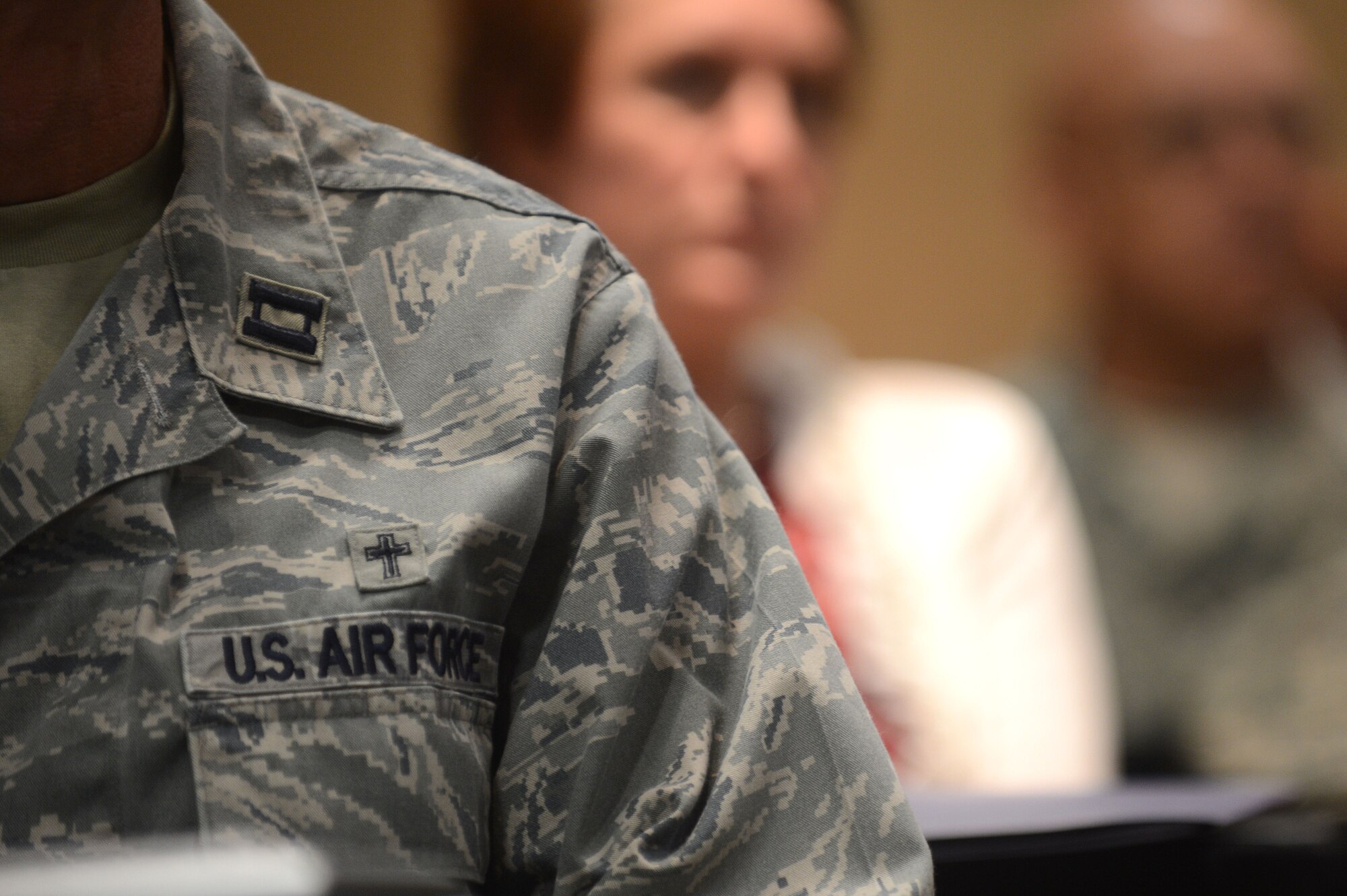 U.S. Air Force chaplains and chaplain assistants gathered for a symposium at the Holiday Inn, Columbia, S.C., June 18, 2013.  They discussed how to prepare to meet the spiritual needs of Airmen and other service members down range.  Four Airmen from the 20th Civil Engineer Squadron explosive ordnance disposal at Shaw spoke at the symposium about combat deployments and the vital role that chaplains had played for them.  (U.S. Air Force photo by Airman Nicole Sikorski/Released)
