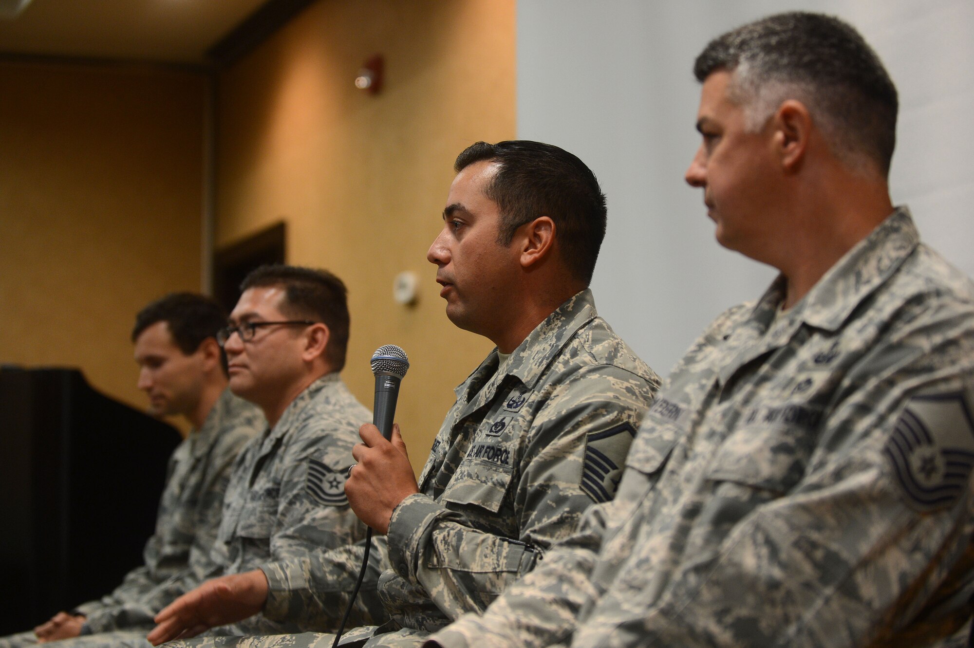 U.S. Air Force MSgt. Alejandro Rodriquez, 20th Civil Engineer Squadron explosive ordnance disposal technician speaks at a chaplain symposium at the Holiday Inn, Columbia, S.C., June 18, 2013.  Chaplains discussed how to prepare to meet the spiritual needs of Airmen and other service members down range. The EOD Airmen spoke about combat deployments and the vital role that chaplains had played for them.  (U.S. Air Force photo by Airman Nicole Sikorski/Released)
