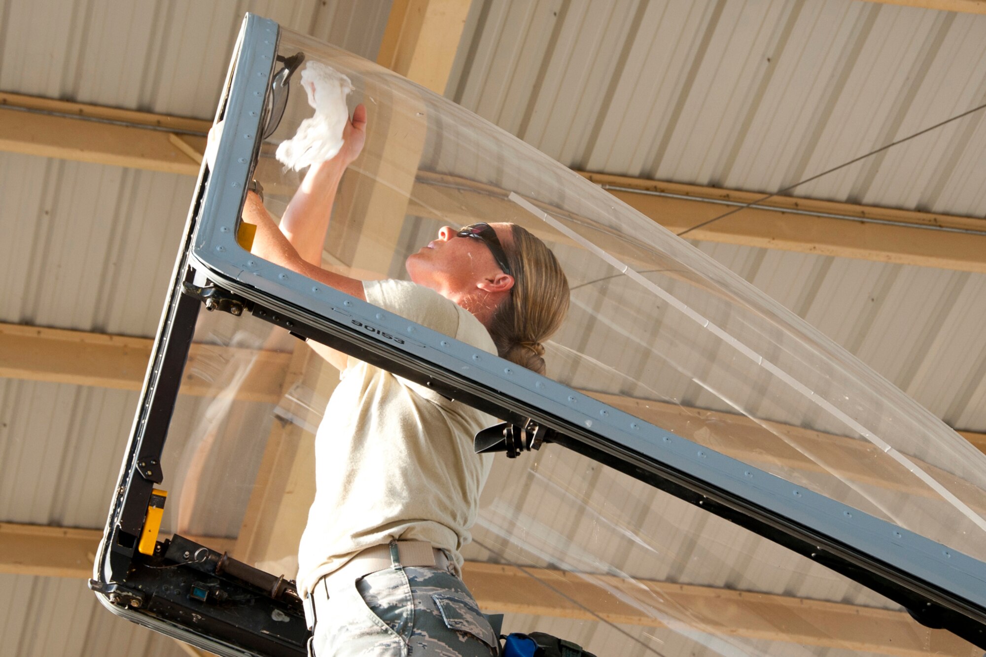 Tech. Sgt. Rikki Welch, who is a crew chief assigned to the 917th Maintenance Squadron, prepares the 917th Fighter Group Flagship for its final flight from Barksdale Air Force Base, La., June 24, 2013. Col. John Breazeale, commander, 917 FG, piloted the A-10 Thunderbolt to Davis-Monthan Air Force Base, Ariz. Approximately 200 people gathered on the flight line to watch the sendoff. The A-10 was one of the last three A-10s to leave Barksdale. The transfer of all the A-10s from Barksdale is due to the recent Force Structure Action Implementation Plan that dictates the 917 FG will be inactivated this year on the last day of September. (U.S. Air Force photo by Master Sgt. Jeff Walston/Released) 