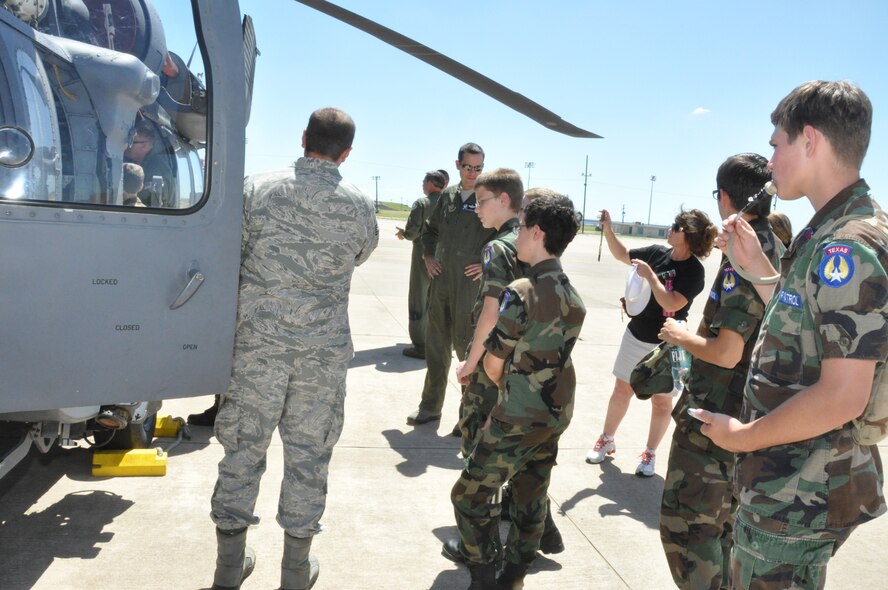 The 305th Rescue Squadron treated Denton and Alliance Civil Air Patrol students to a tour of their HH-60 Pave Hawk helicopter June 13 at the Naval Air Station Fort Worth Joint Reserve Base, Texas.  They were shown all the aminties that this metal giant has to offer to assist the aircrews in their search and rescue missions. (U.S. Air Force photo/Master Sgt. Julie Briden-Garcia)