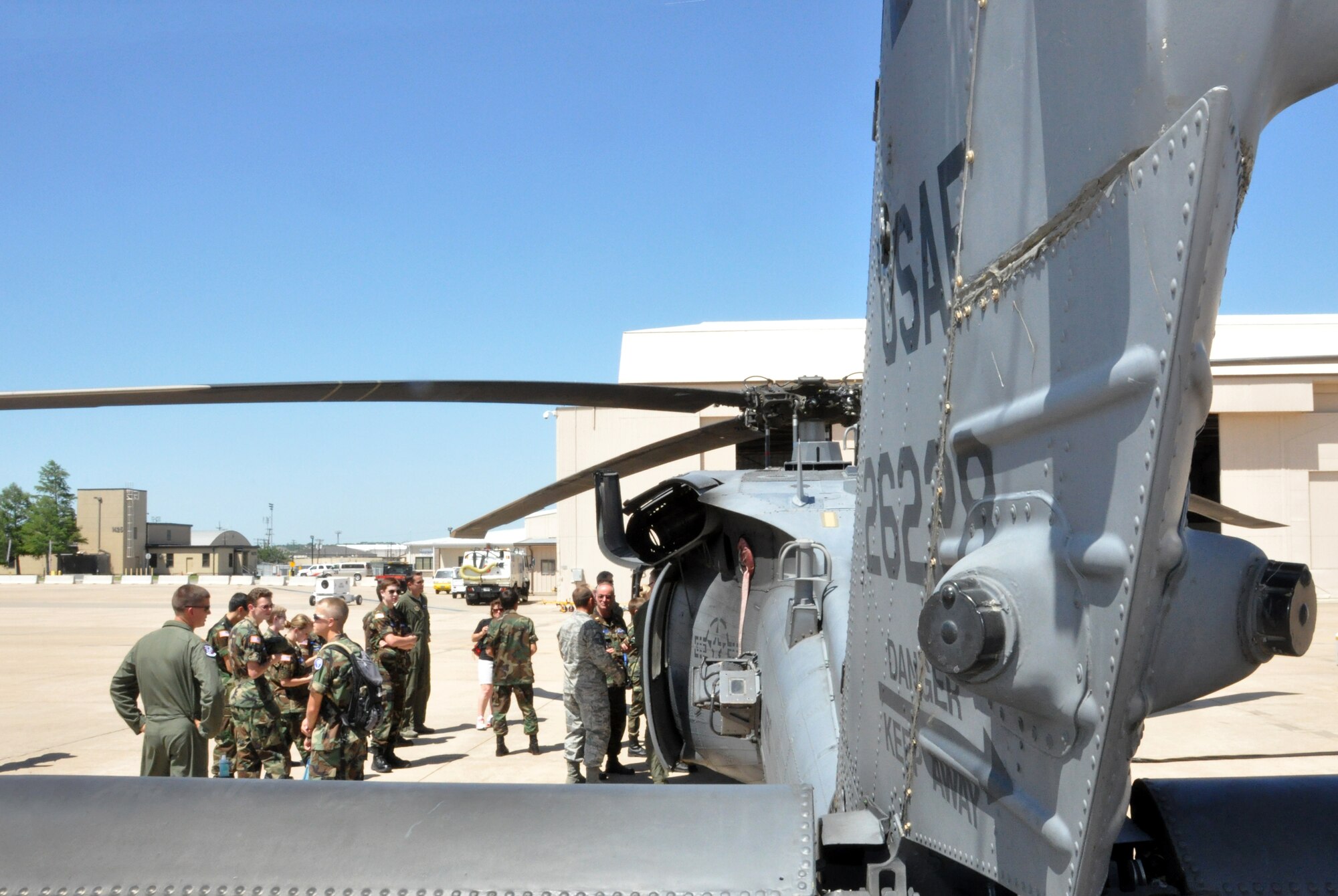 More than a dozen middle school and high school-aged civil air patrol students were treated to a tour of the 305th Rescue Squadron's HH-60 Pave Hawk helicopter June 13 at the Naval Air Station Fort Worth Joint Reserve Base, Texas. They were shown all the aminties that this metal giant has to offer to assist the aircrews in their search and rescue missions. (U.S. Air Force photo/Master Sgt. Julie Briden-Garcia)