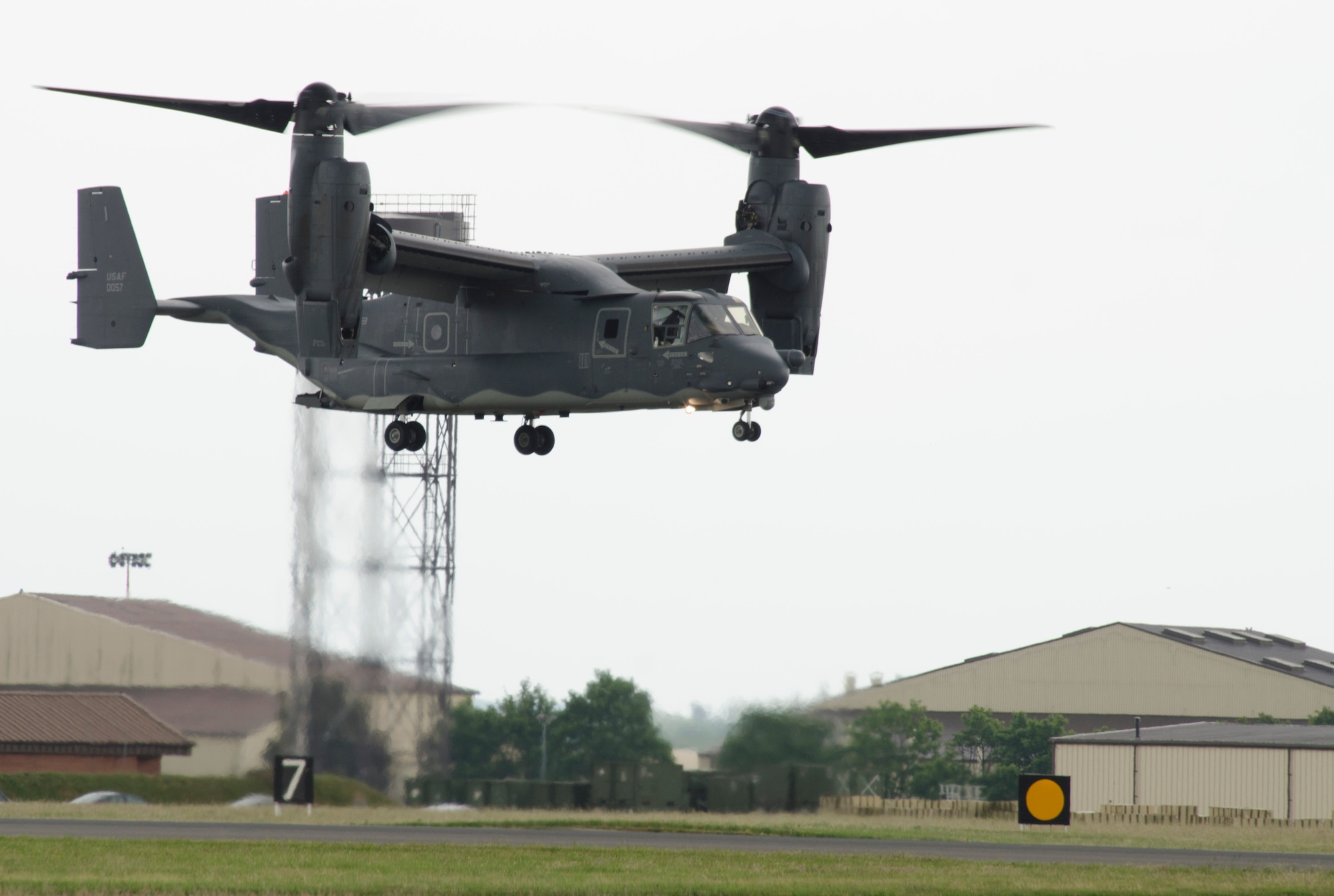 A CV-22B Osprey prepares to land June 24, 2013, at RAF Mildenhall, England. The Osprey, assigned to the 7th Special Operations Squadron, is the first of 10 slated to arrive as part of the 352nd Special Operations Group expansion, which will last through the end of 2014. (U.S. Air Force photo by Staff Sgt. Stephen Linch/Released)