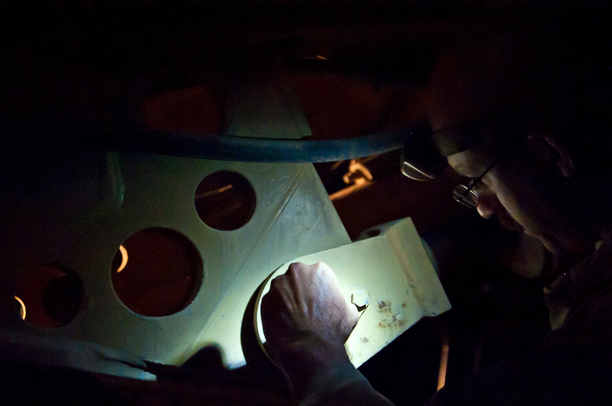 Tech. Sgt. Matthew Manfredi, 451st Expeditionary Logistics Readiness Squadron, inspects a Halvorsen 25K aircraft cargo loader at Kandahar Airfield, Afghanistan, May 29, 2013. Vehicle maintainers are responsible for maintenance on all vehicles assigned to the 451st Air Expeditionary Wing. Manfredi is deployed here from the 100th Logistics Readiness Squadron at Royal Air Force Mildenhall, United Kingdom. (U.S. Air Force photo/Senior Airman Scott Saldukas)
