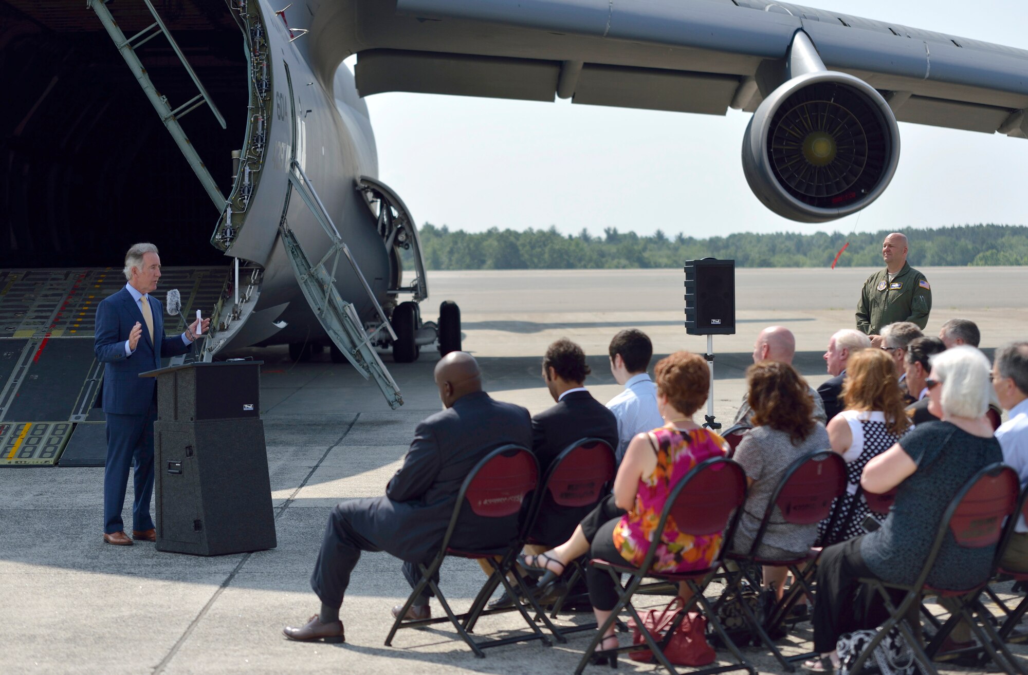 Massachusetts Congressman Richard Nealspeaks to 40 civic, business, and military leaders gathered at a ceremony June 24 announcing a $24.4M contract to fund
a new fuel hydrant system on base. 
