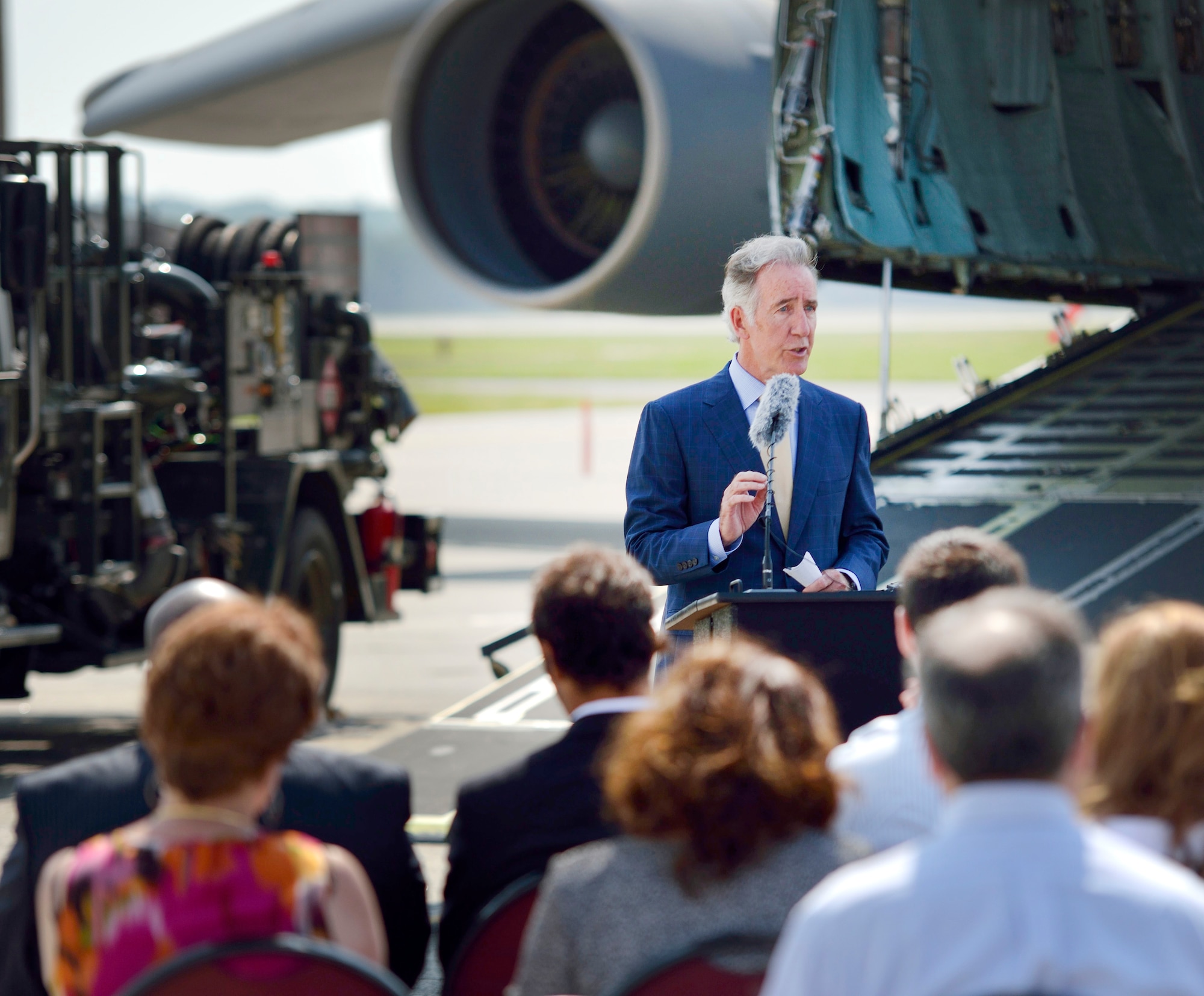 Massachusetts Congressman Richard Nealspeaks to 40 civic, business, and military leaders gathered at a ceremony June 24 announcing a $24.4M contract to fund
a new fuel hydrant system on base. 
