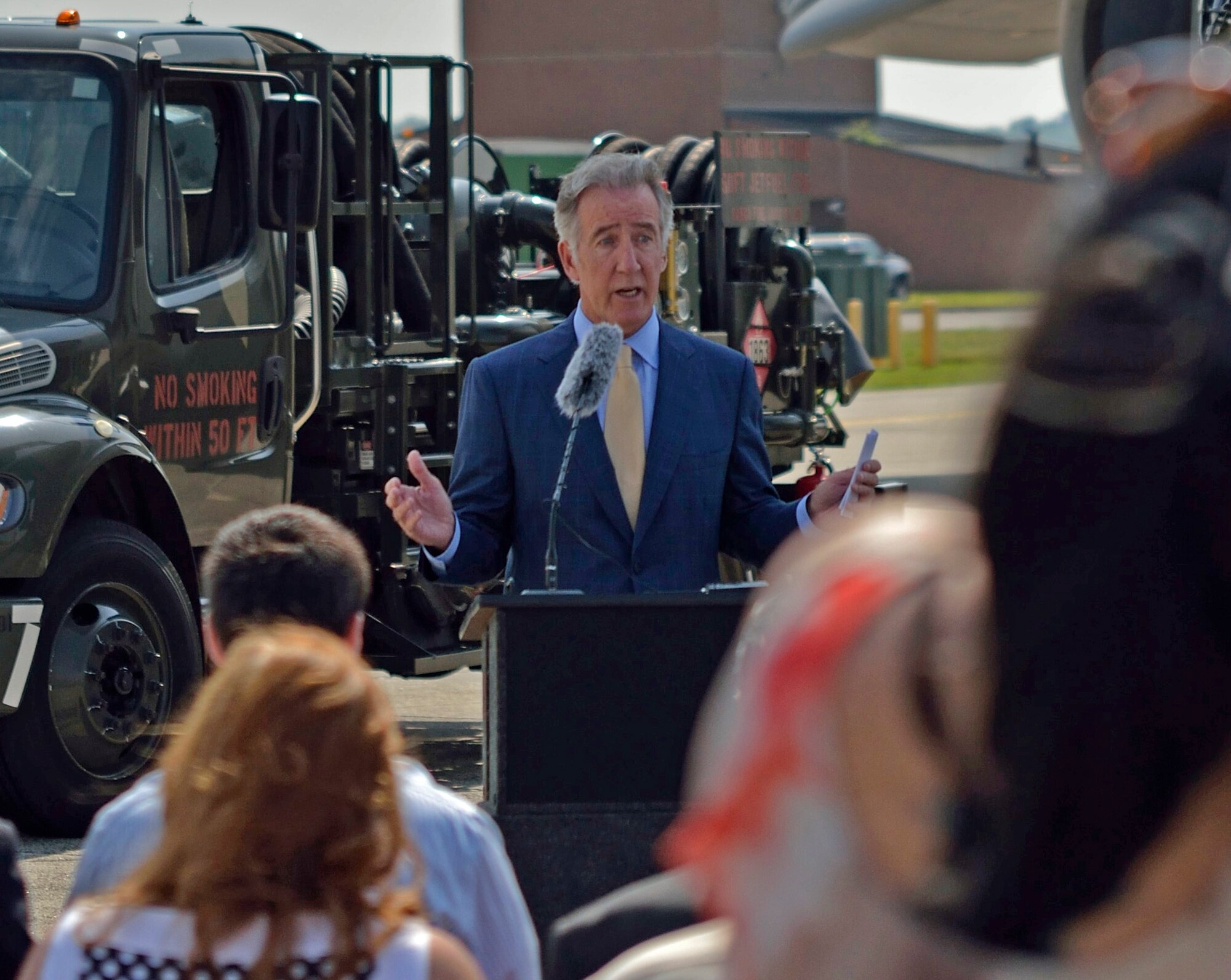 Massachusetts Congressman Richard Nealspeaks to 40 civic, business, and military leaders gathered at a ceremony June 24 announcing a $24.4M contract to fund
a new fuel hydrant system on base. 
