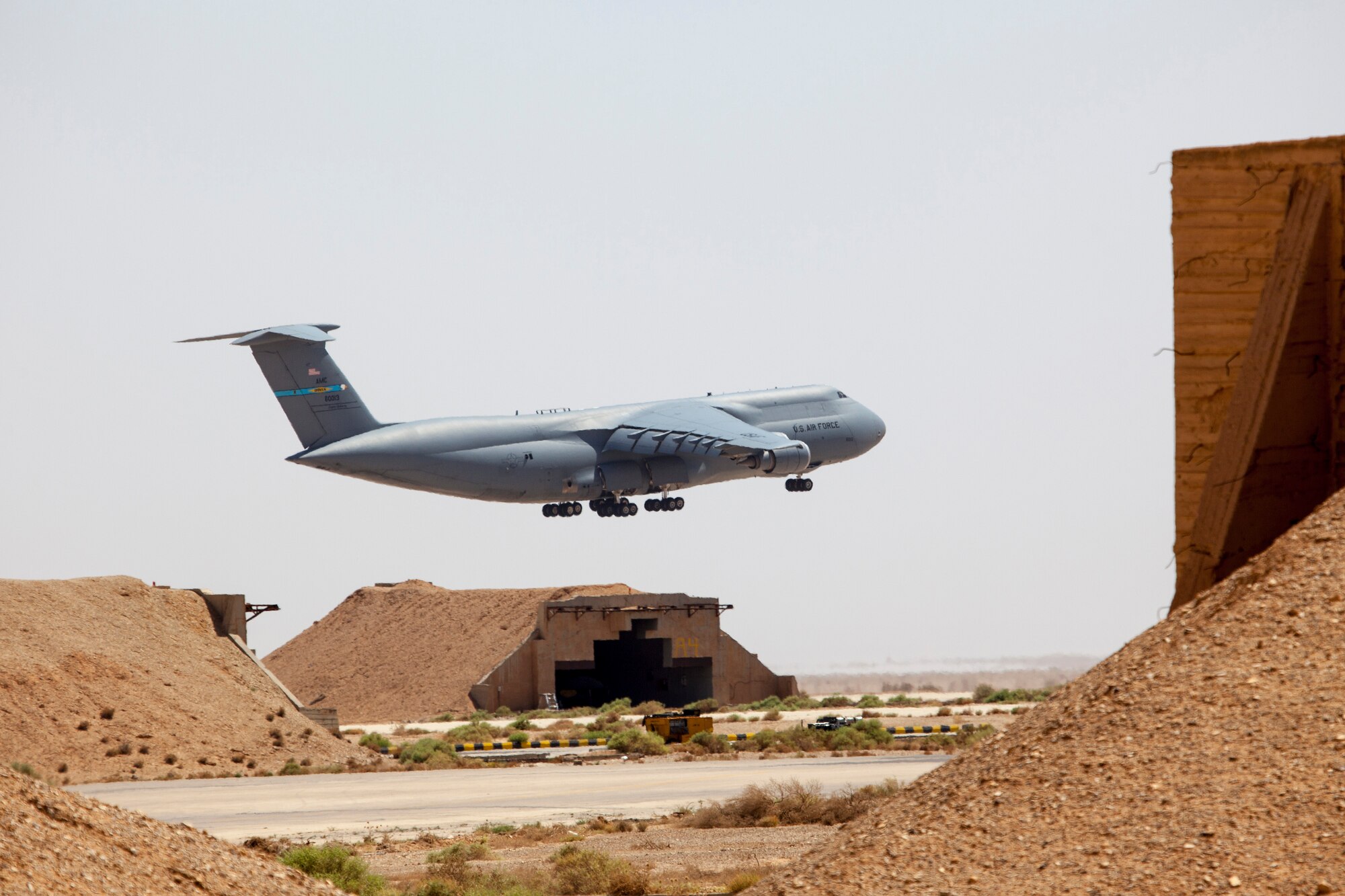 A C-5 Galaxy aircraft lands at a training base in Northern Jordan as part of Exercise Eager Lion. Eager Lion is a U.S. Central Command-directed, irregular warfare-themed exercise focusing on missions the United States and its coalition partners might perform in support of global contingency operations. (U.S. Air National Guard photo by Senior Master Sgt. John P. Rohrer)