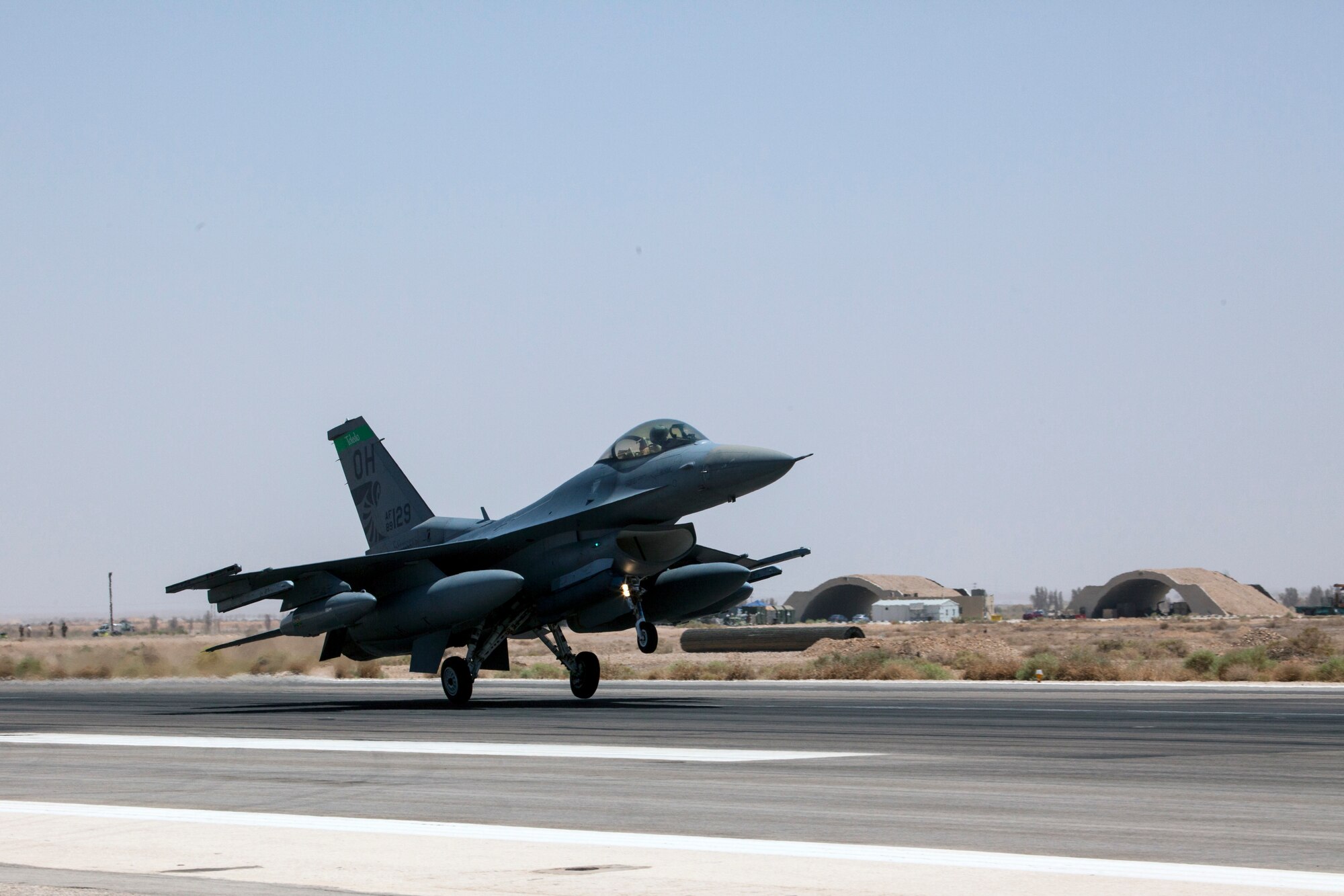 An F-16 Fighting Falcon from the 180th Fighter Wing, Ohio Air National Guard, arrives at a training base in Northern Jordan as part of Exercise Eager Lion. Eager Lion is a U.S. Central Command-directed, irregular warfare-themed exercise focusing on missions the United States and its coalition partners might perform in support of global contingency operations. (U.S. Air National Guard photo by Senior Master Sgt. John P. Rohrer)