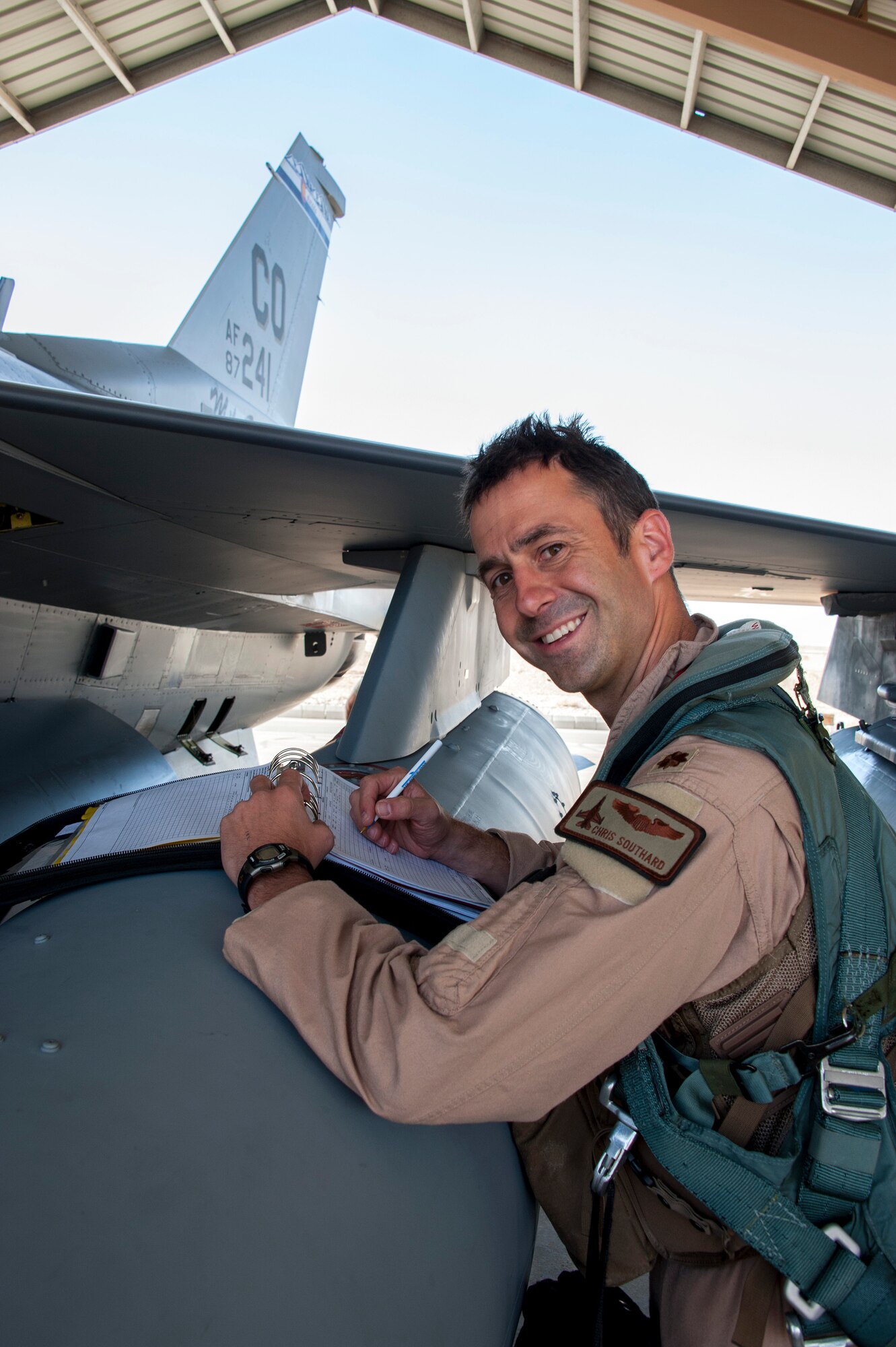 Major Christopher Southard, a pilot with the Colorado Air National Guard, completes his post-flight checklist after arriving at a training base in Northern Jordan as part of the Eager Lion exercise. Eager Lion is a U.S. Central Command-directed, irregular warfare-themed exercise focusing on missions the United States and its coalition partners might perform in support of global contingency operations. (U.S. Air National Guard photo by Senior Master Sgt. John P. Rohrer)