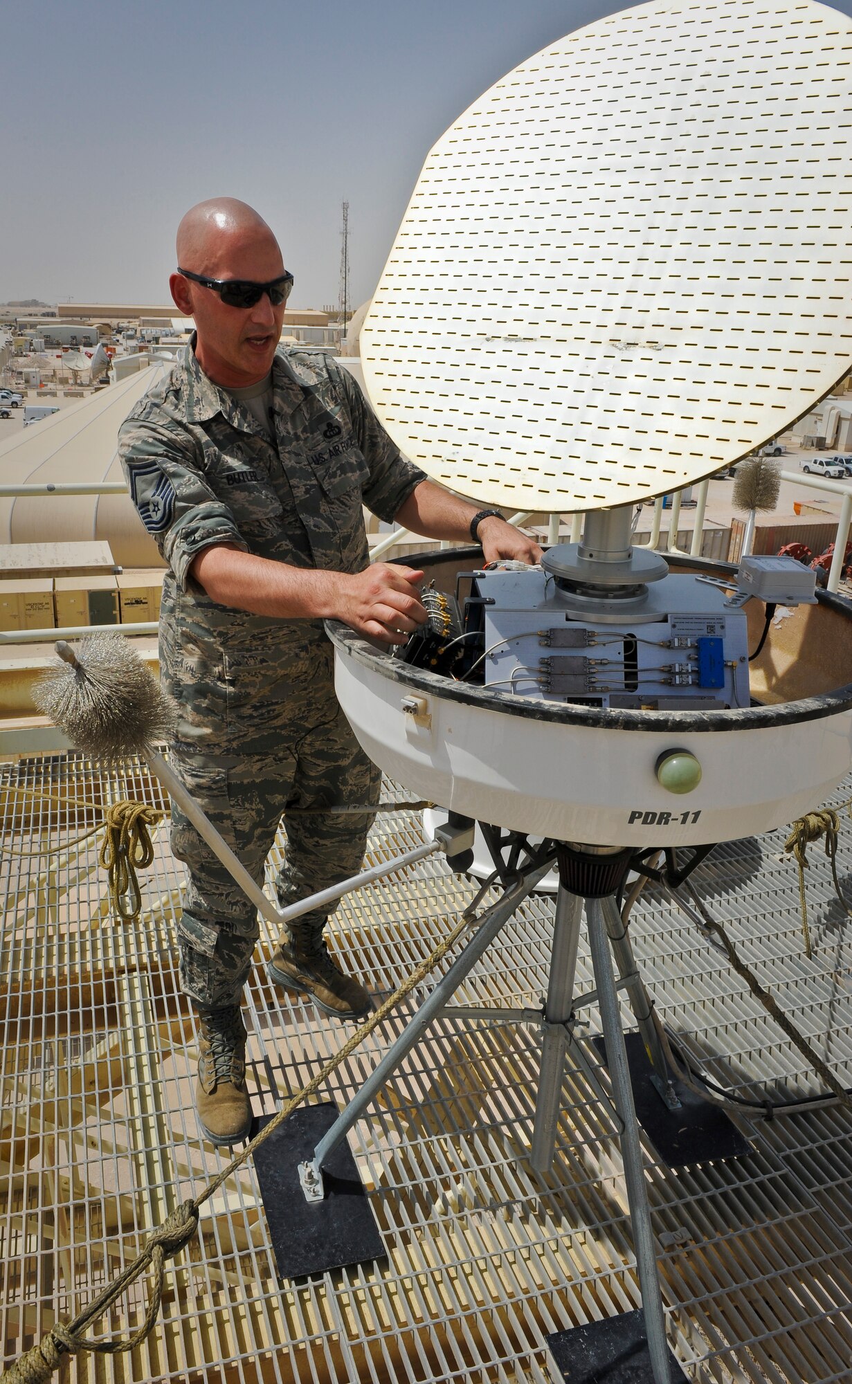 Senior Master Sgt. Scott Butler performs preventative maintenance on the 379th Expeditionary Operations Support Squadron’s portable Doppler radar at the 379th Air Expeditionary Wing in Southwest Asia. Butler is the 379th EOSS weather flight chief deployed from Offutt Air Force Base, Neb. (U.S. Air Force photo/Senior Airman Benjamin Stratton)